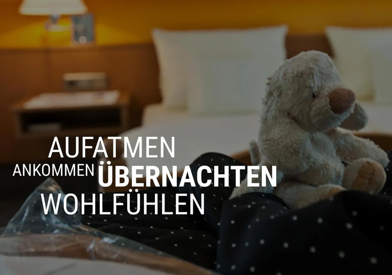 Bed in Mangolds Boutique Hotel & Fruehstuecksmeisterei