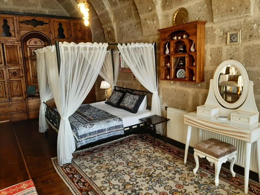 Photo of the whole room, Bed in Kapadokya Ihlara Konaklari & Caves