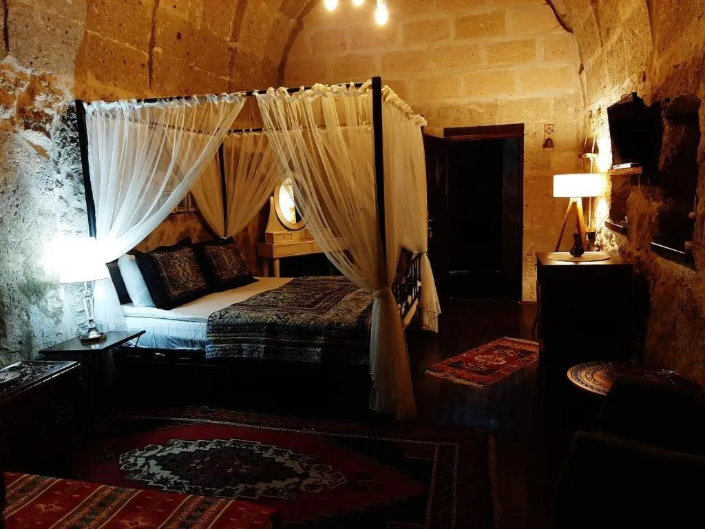 Photo of the whole room, Bed in Kapadokya Ihlara Konaklari & Caves