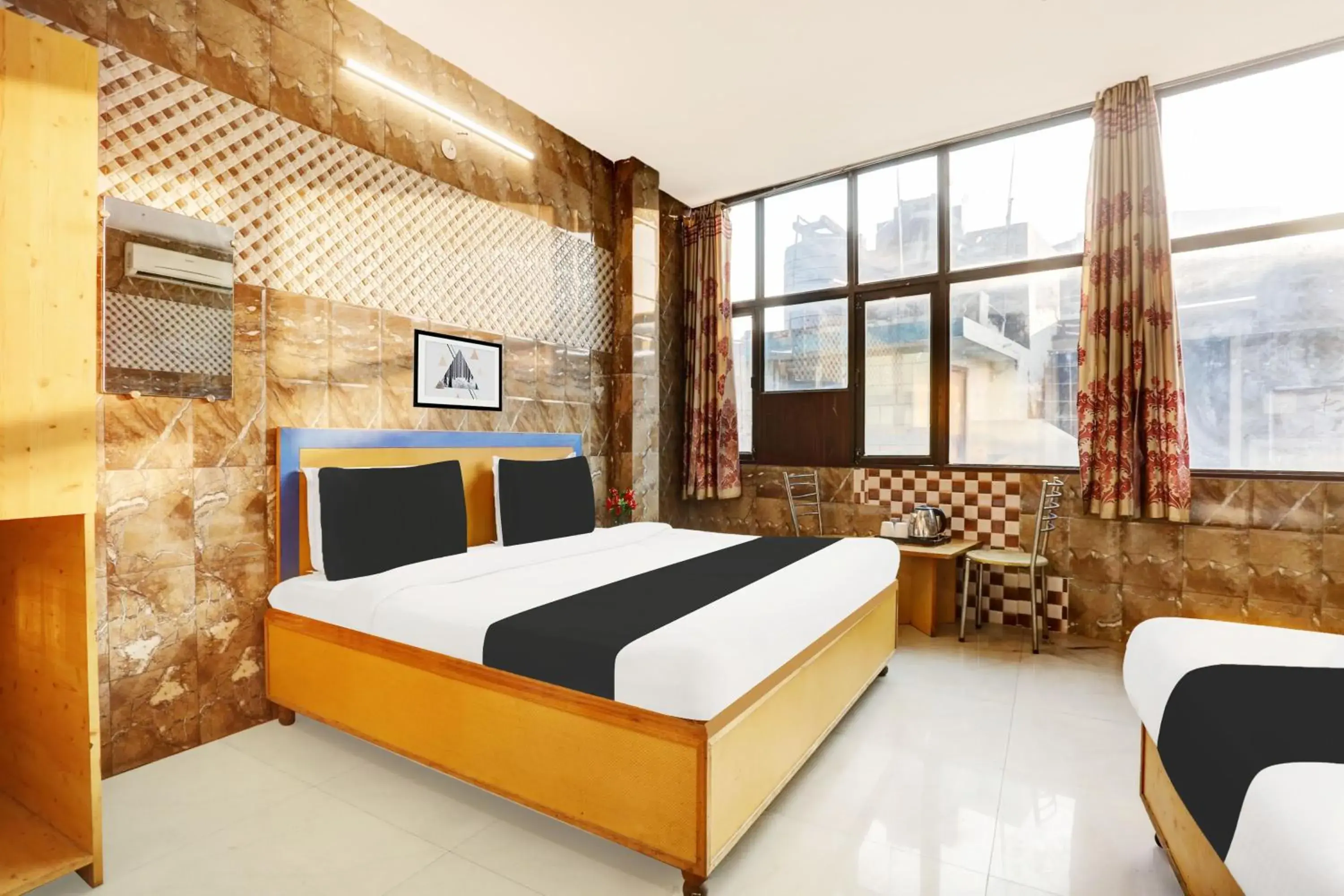 Bedroom, Bed in Hotel O Jammu Near Ragunath Bazaar Formerly GoodWill Bedroom, Bed in Hotel O Jammu Near Ragunath Bazaar Formerly GoodWill