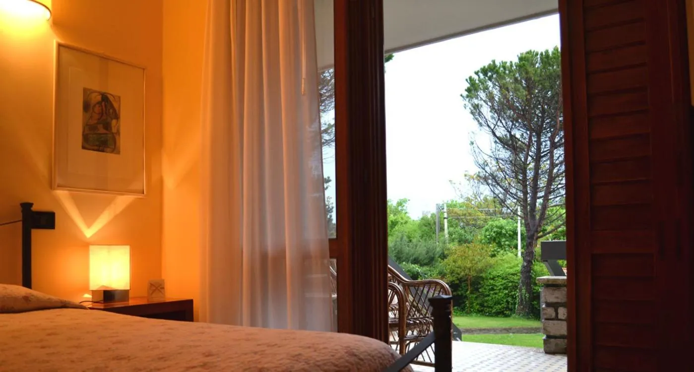 Photo of the whole room, Bed in Villa Rilke Duino