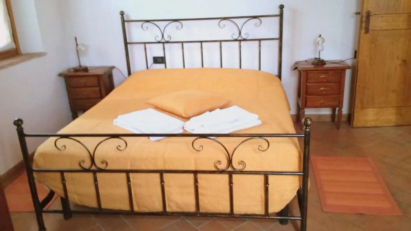 Bedroom in La Garzaga Turismo Rurale