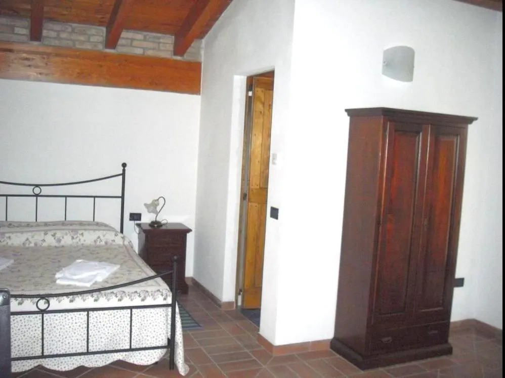 Bedroom in La Garzaga Turismo Rurale