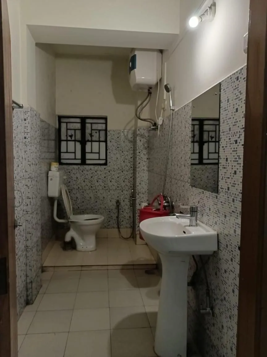 Bathroom in Hotel Travellers INN