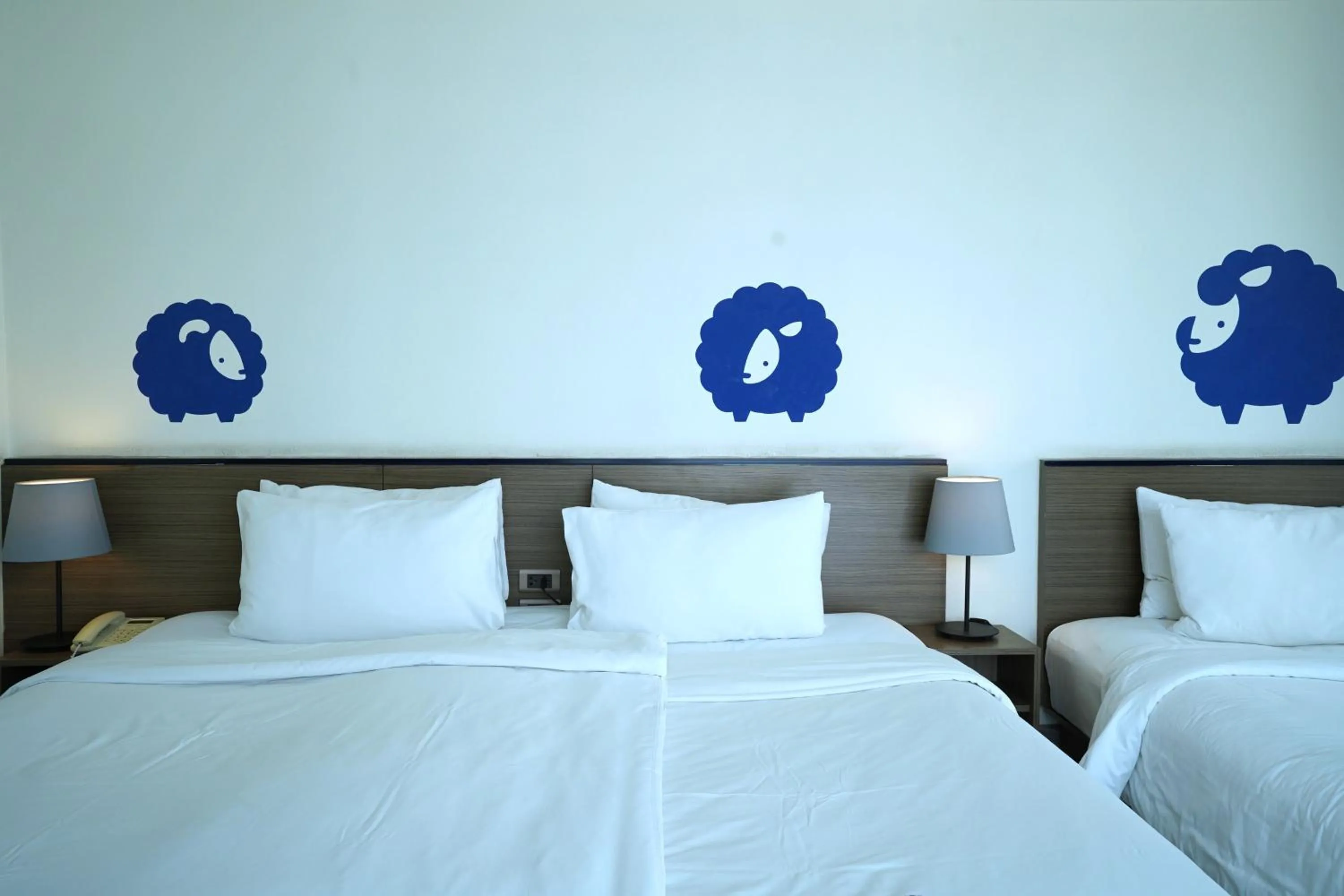 Bed in Kokotel Chiang Mai Nimman