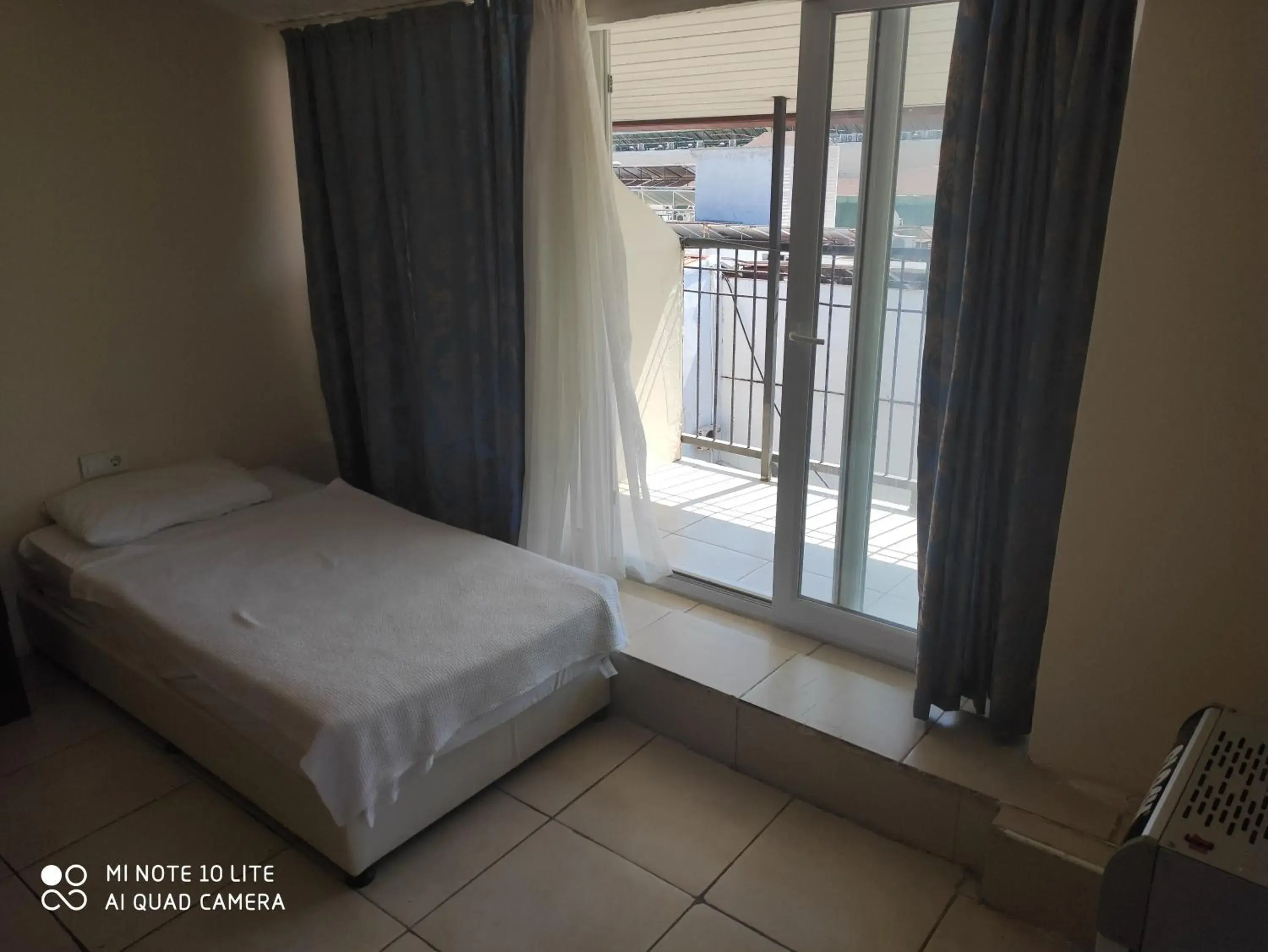 Bed in Romeo Beach Hotel Bed in Romeo Beach Hotel