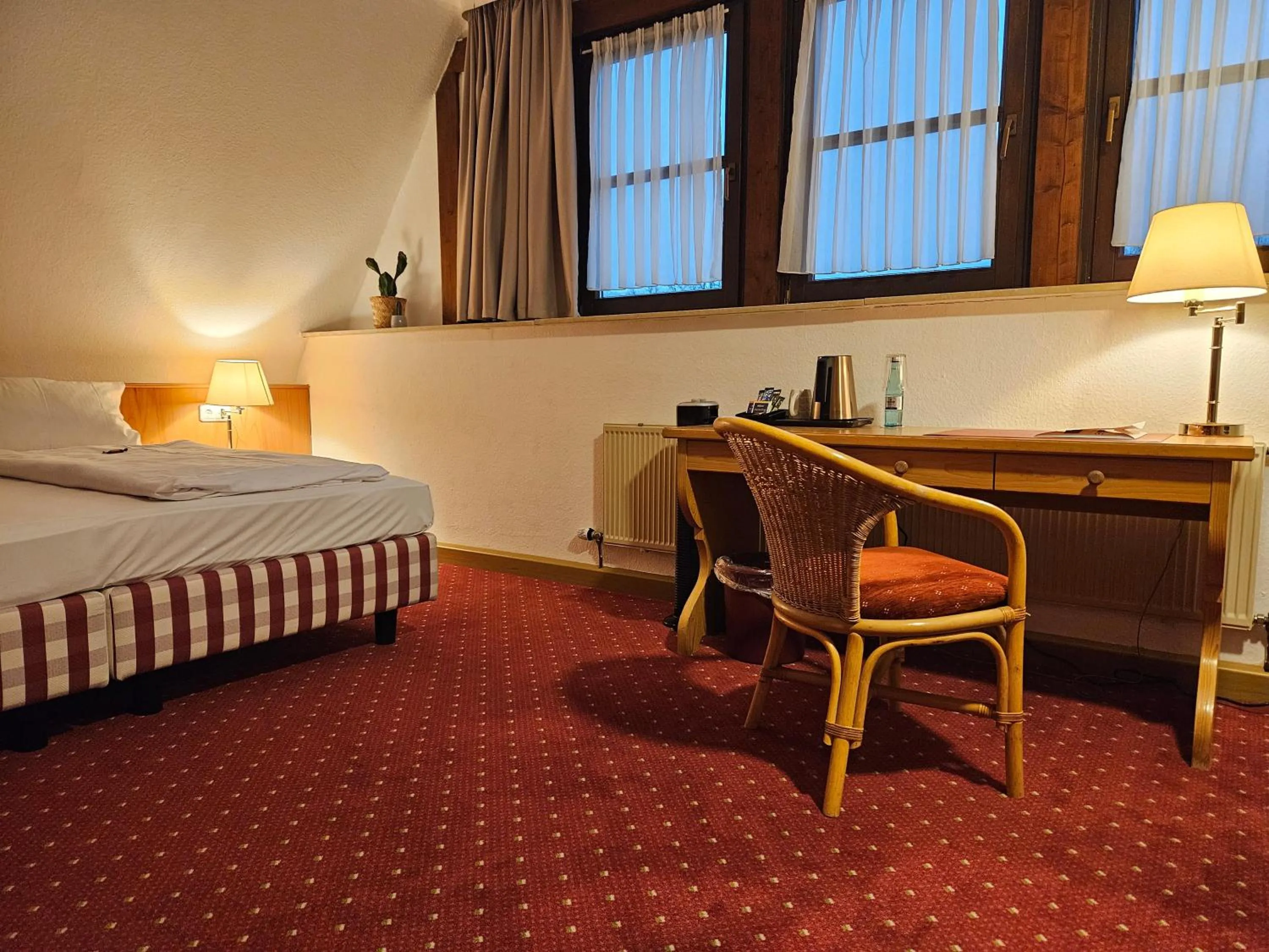 Photo of the whole room, Bed in Landhotel Ölmühle