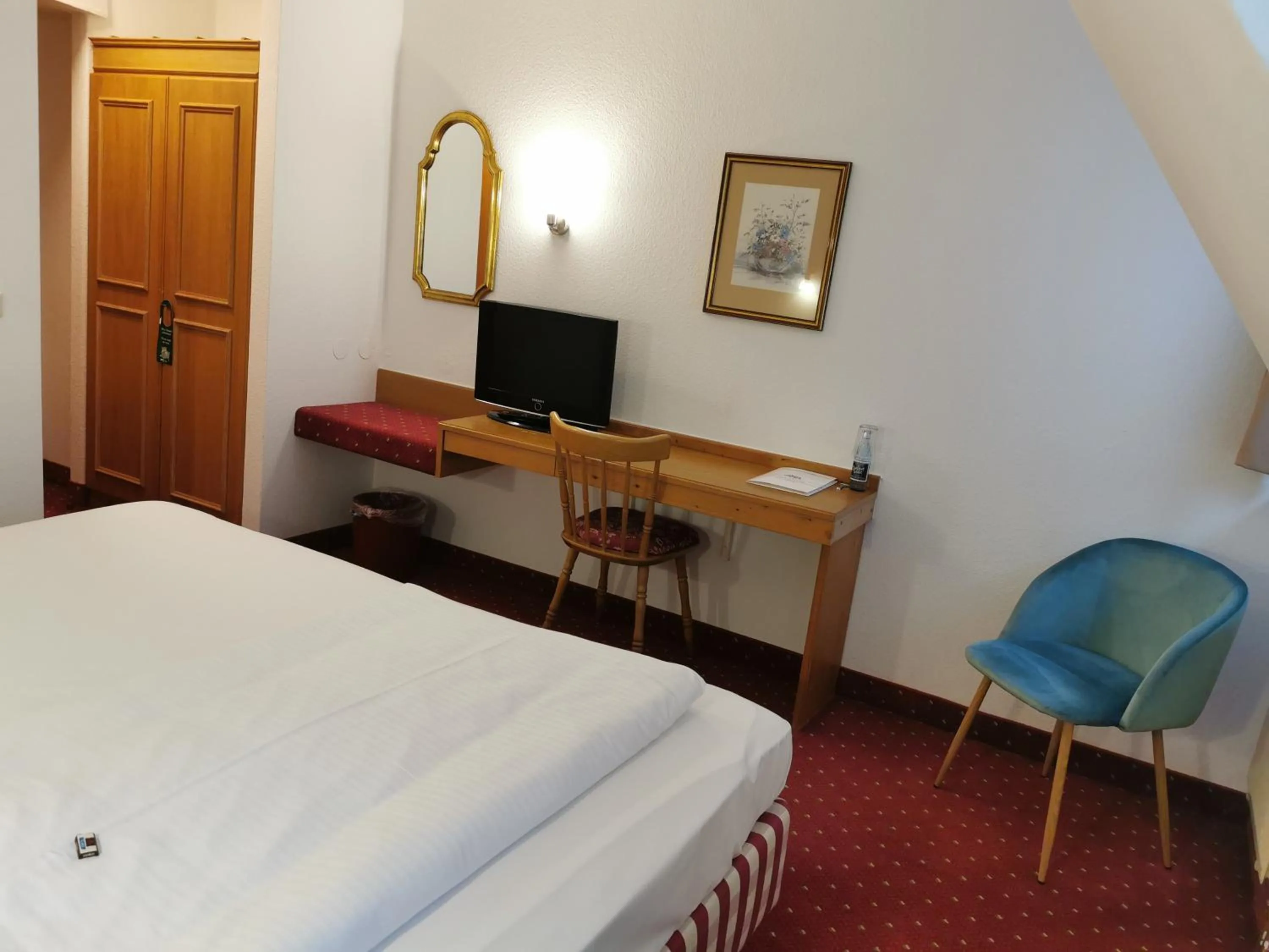 Photo of the whole room, Bed in Landhotel Ölmühle