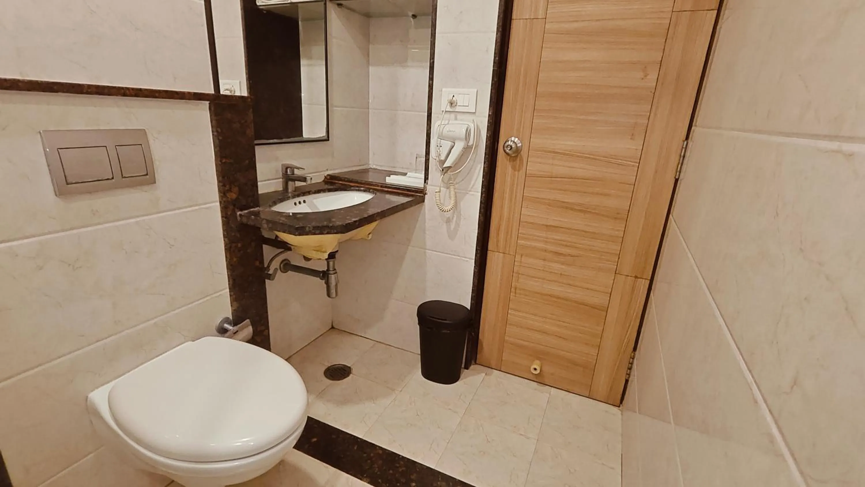 Toilet in ASR Parklane, A Bergamont Hotel - Hosur