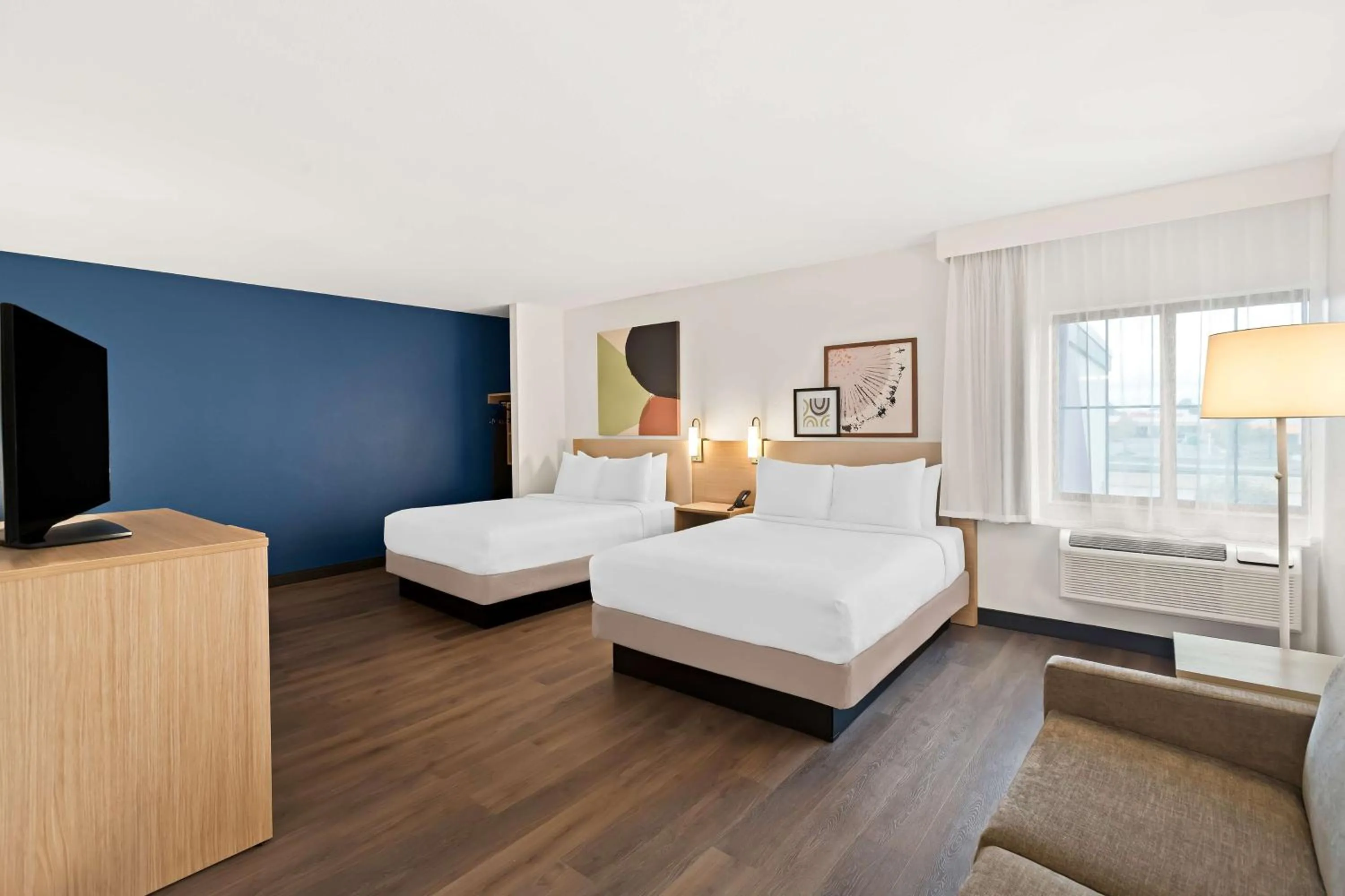 Living room, Bed in Spark by Hilton Wichita East