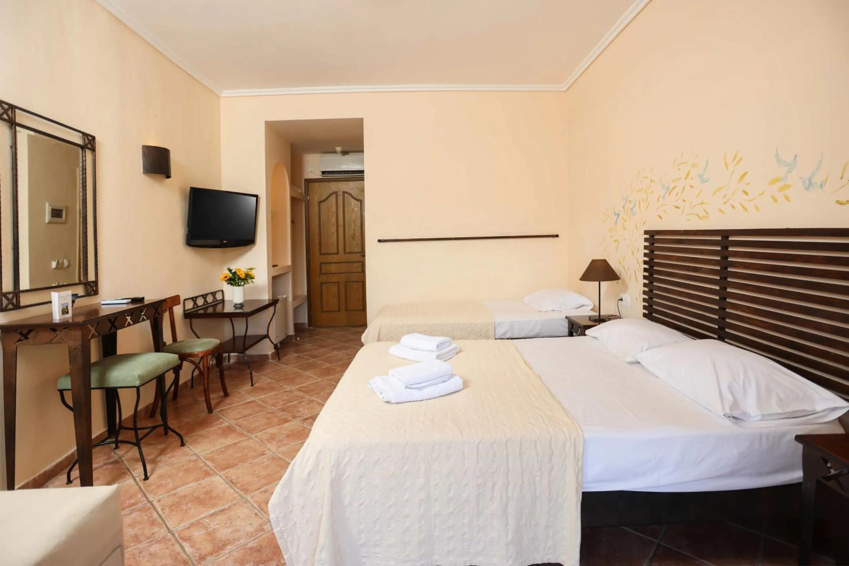 Bed in Ammon Garden Hotel