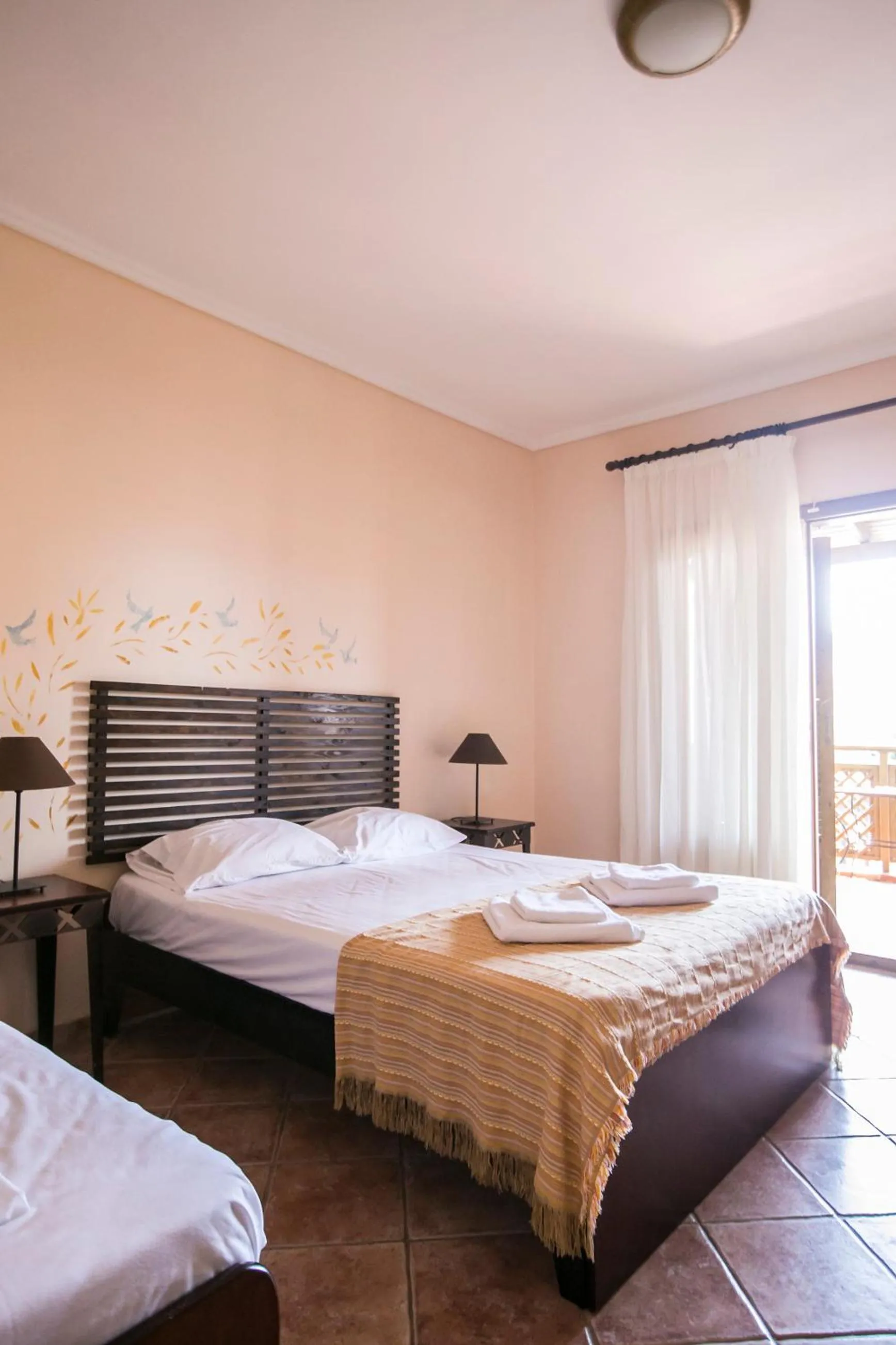 Bed in Ammon Garden Hotel