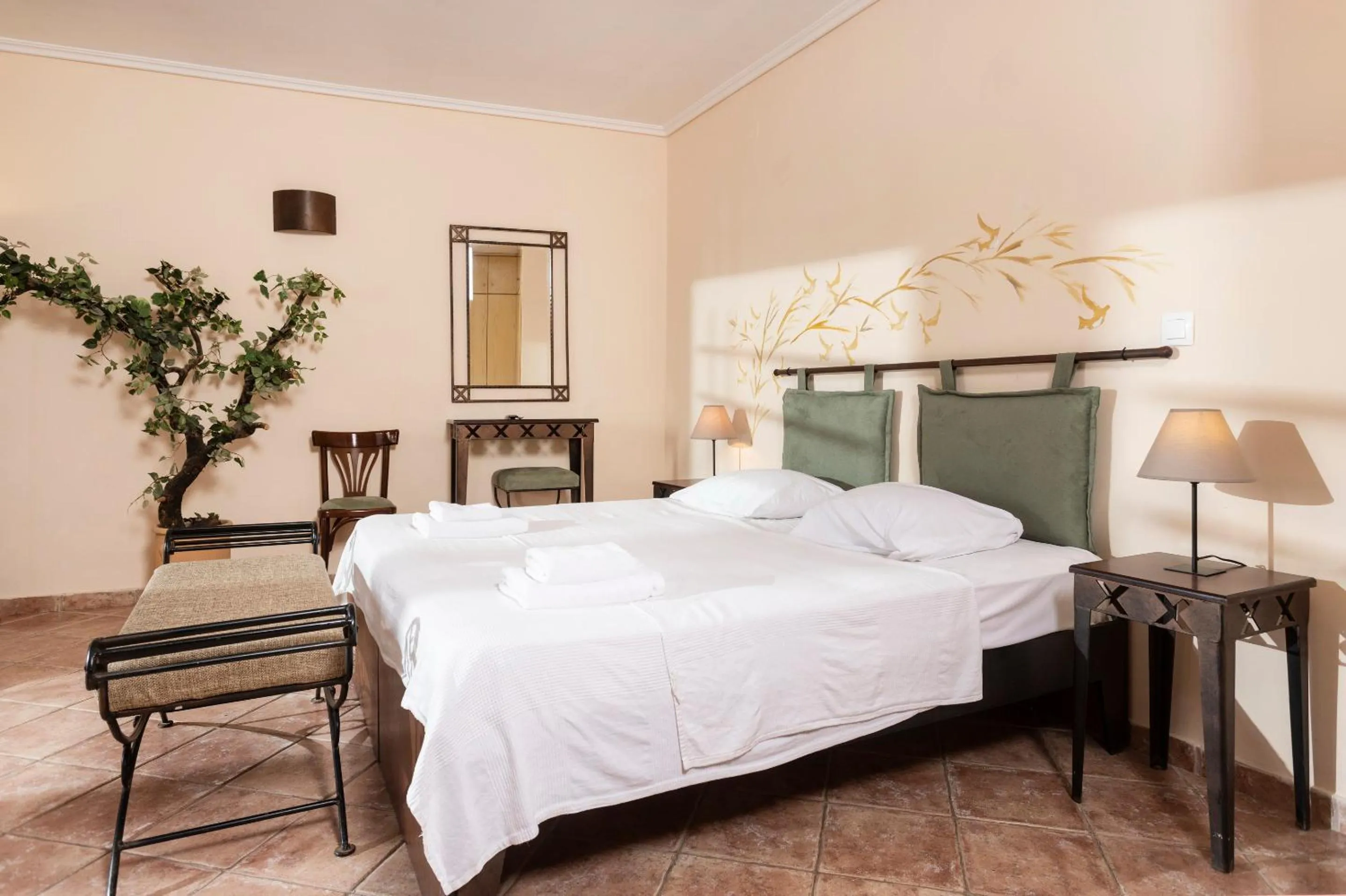 Bed in Ammon Garden Hotel