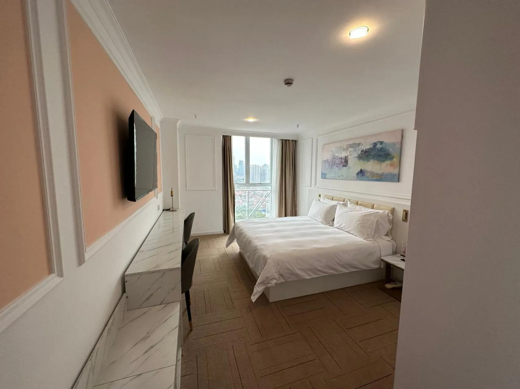 Bed in Magnificent International Hotel