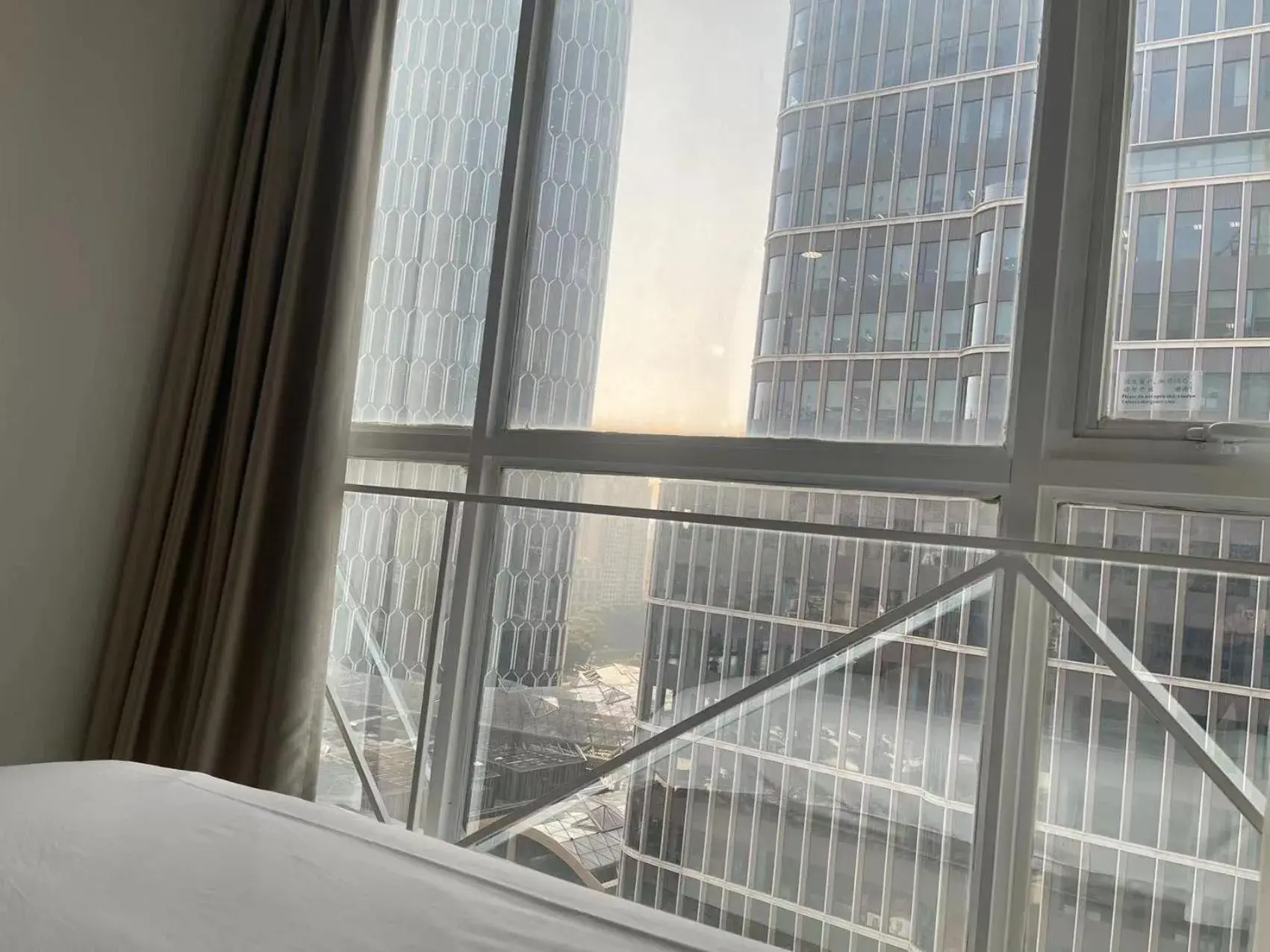 Property building, Bed in Magnificent International Hotel Property building, Bed in Magnificent International Hotel