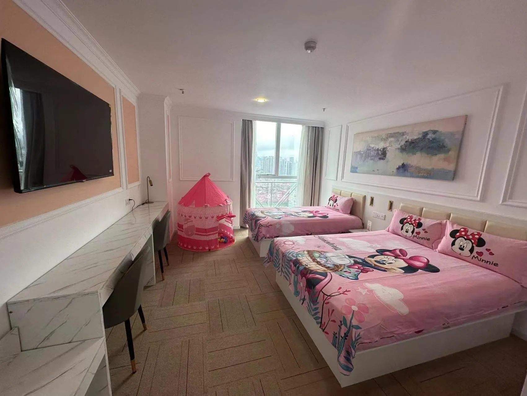 Bed in Magnificent International Hotel