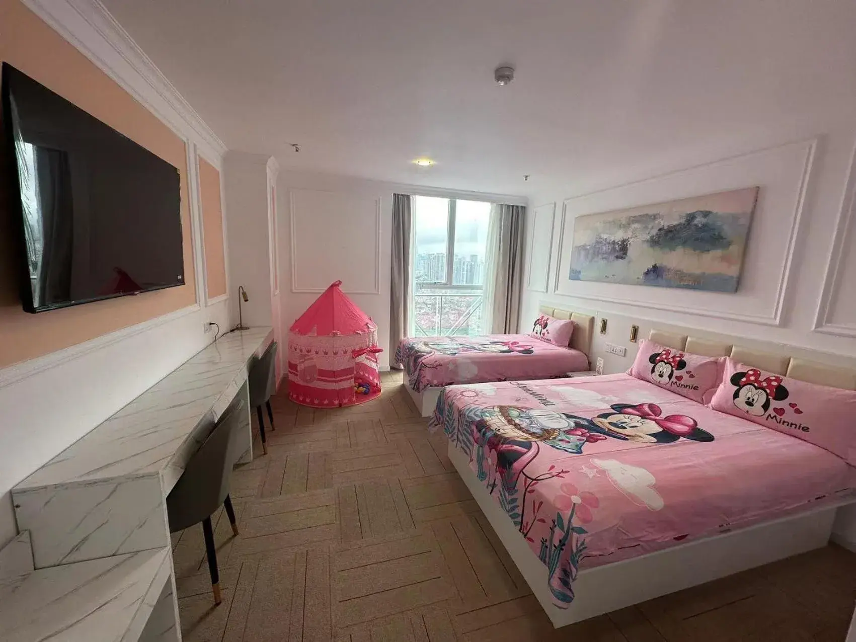 Bed in Magnificent International Hotel Bed in Magnificent International Hotel