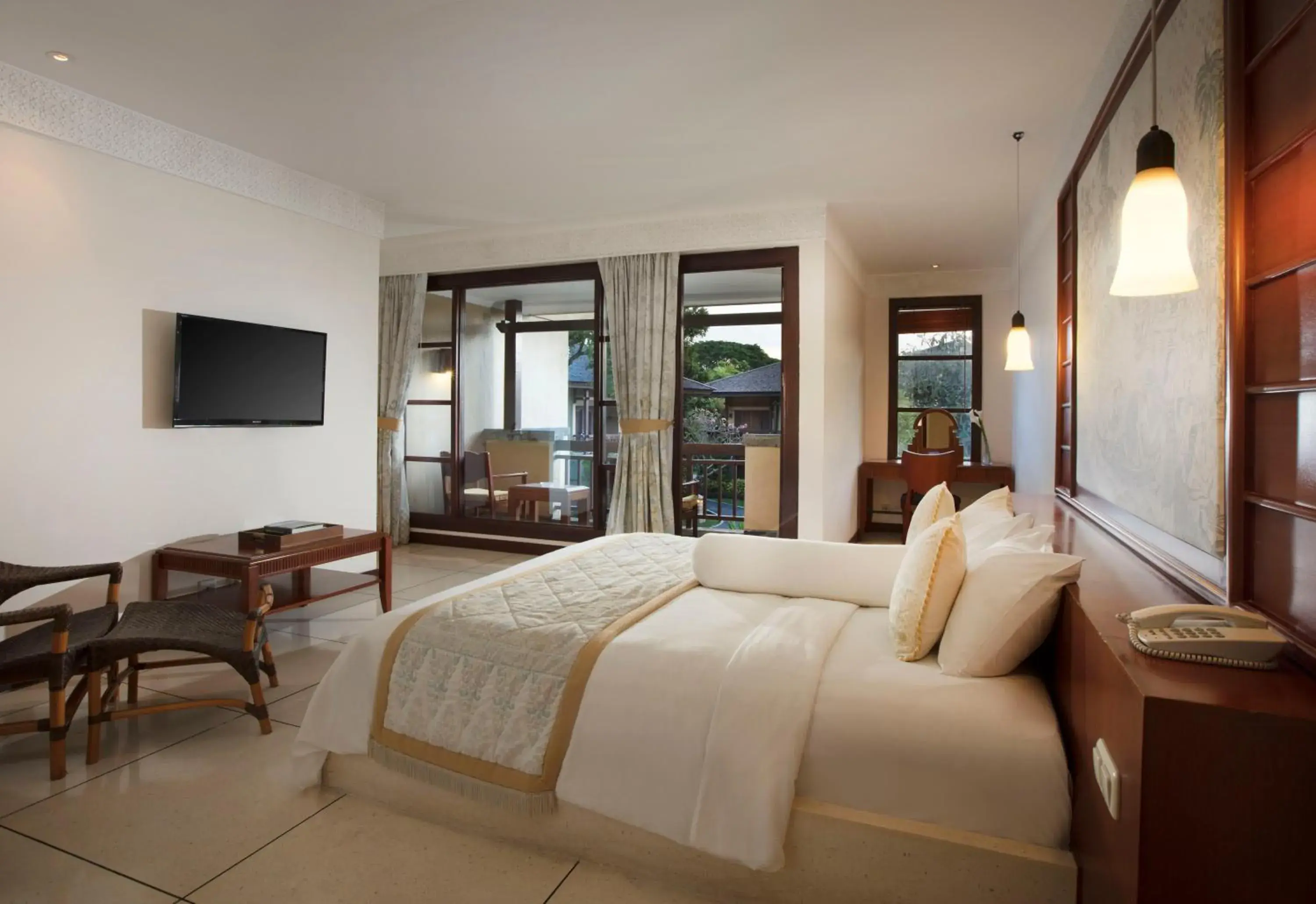 Bedroom, Bed in The Patra Bali Resort & Villas - CHSE Certified Bedroom, Bed in The Patra Bali Resort & Villas - CHSE Certified