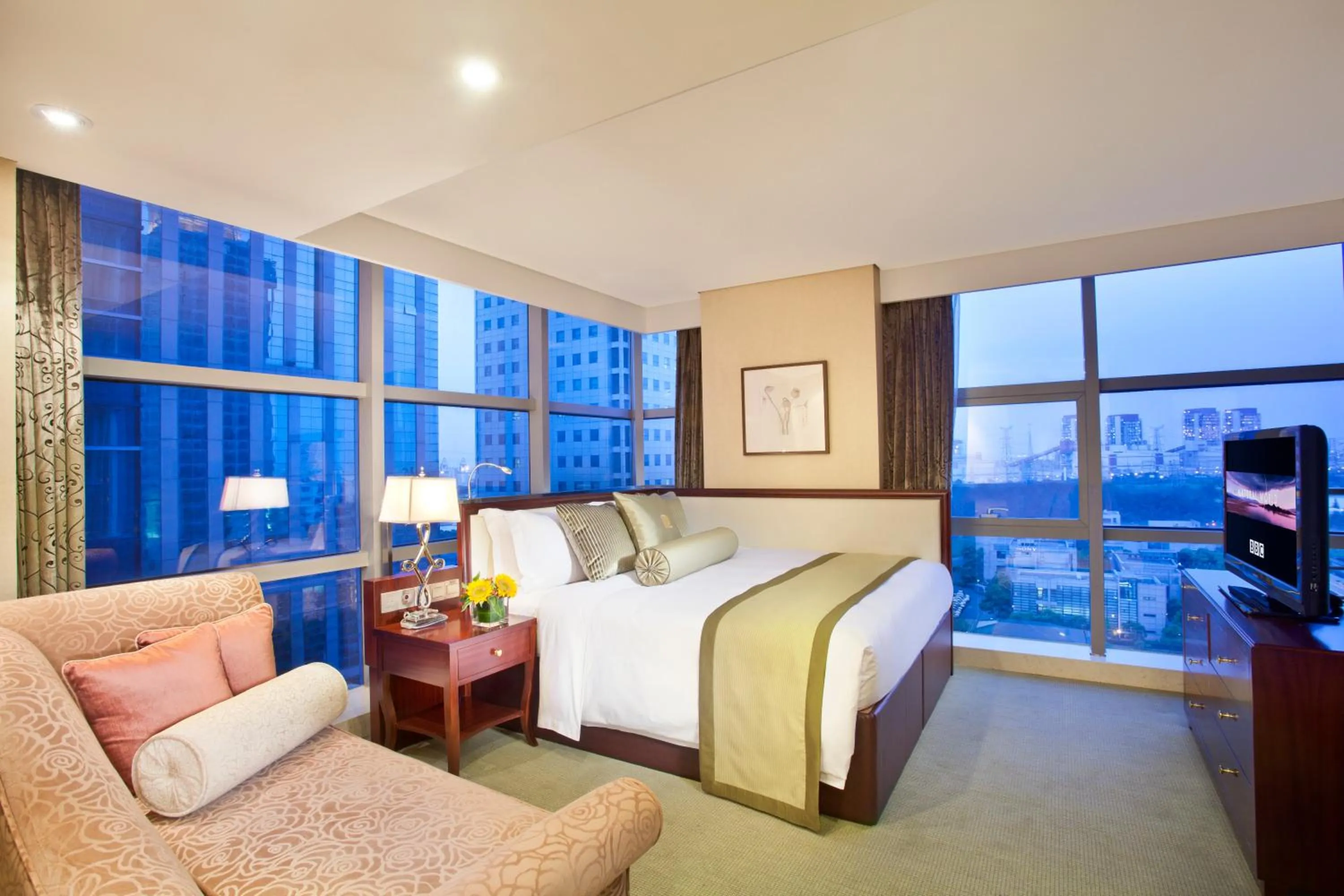 Bedroom in Regal Plaza Hotel & Residence