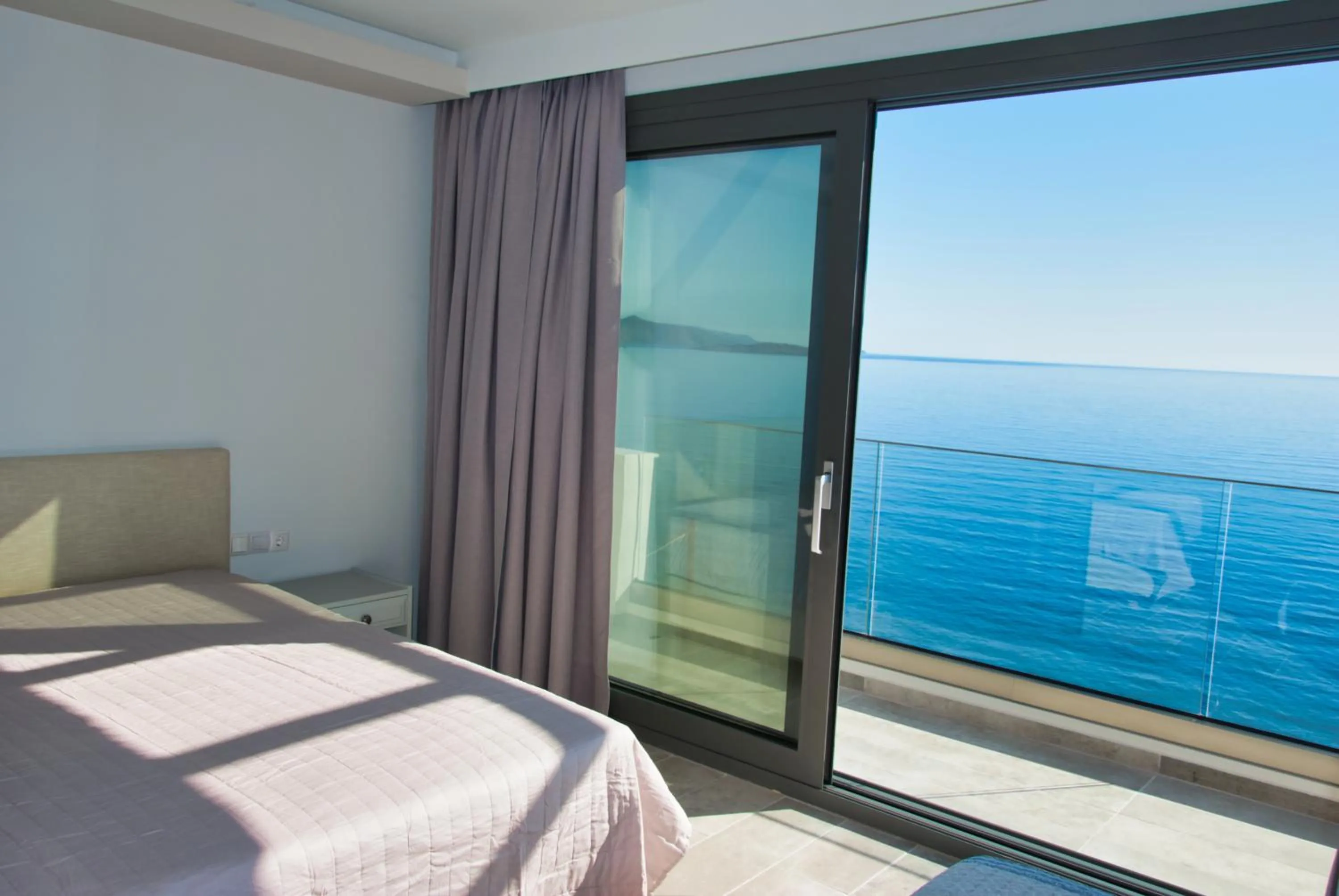 Bed in Ostria Apartments