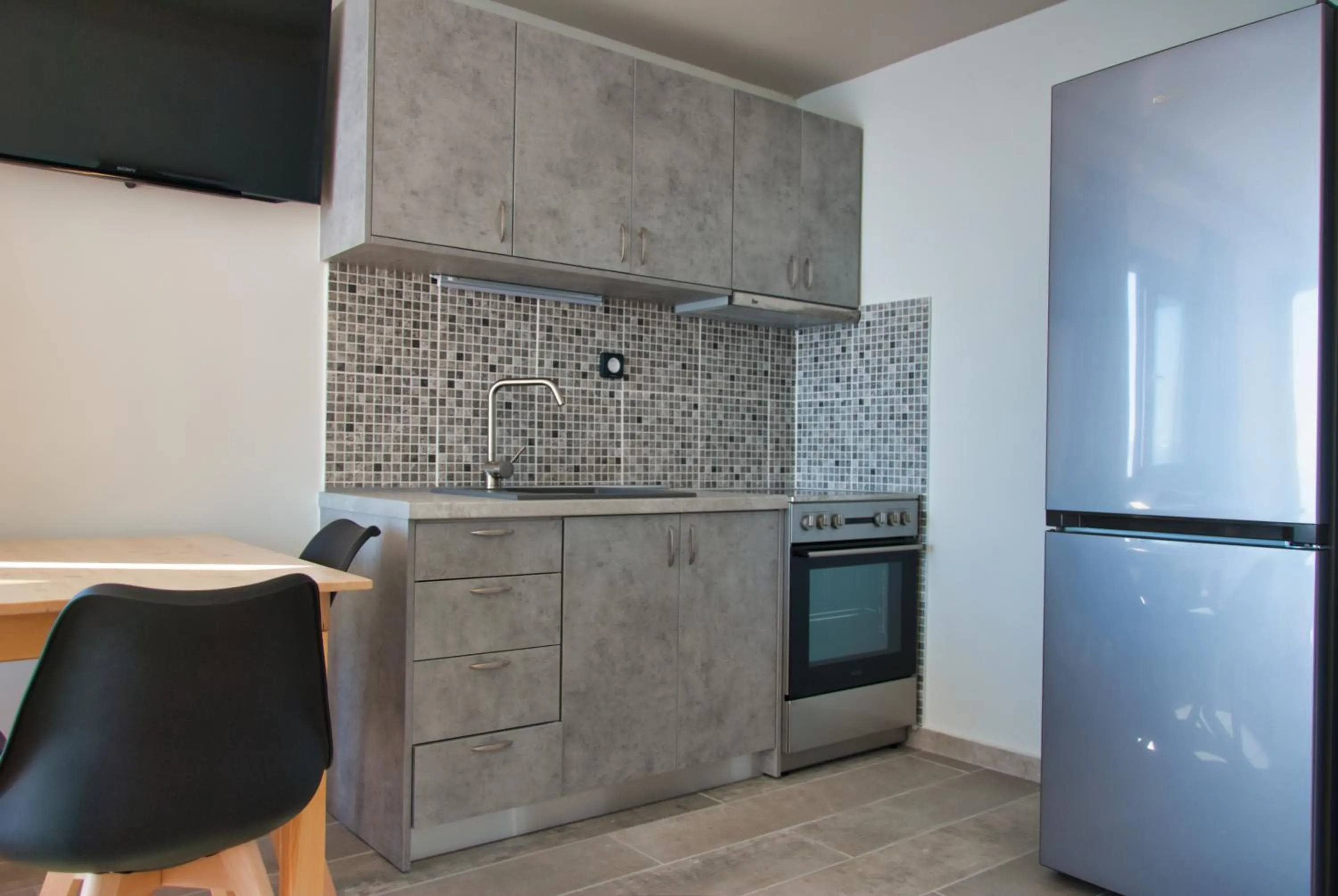 Kitchen or kitchenette in Ostria Apartments