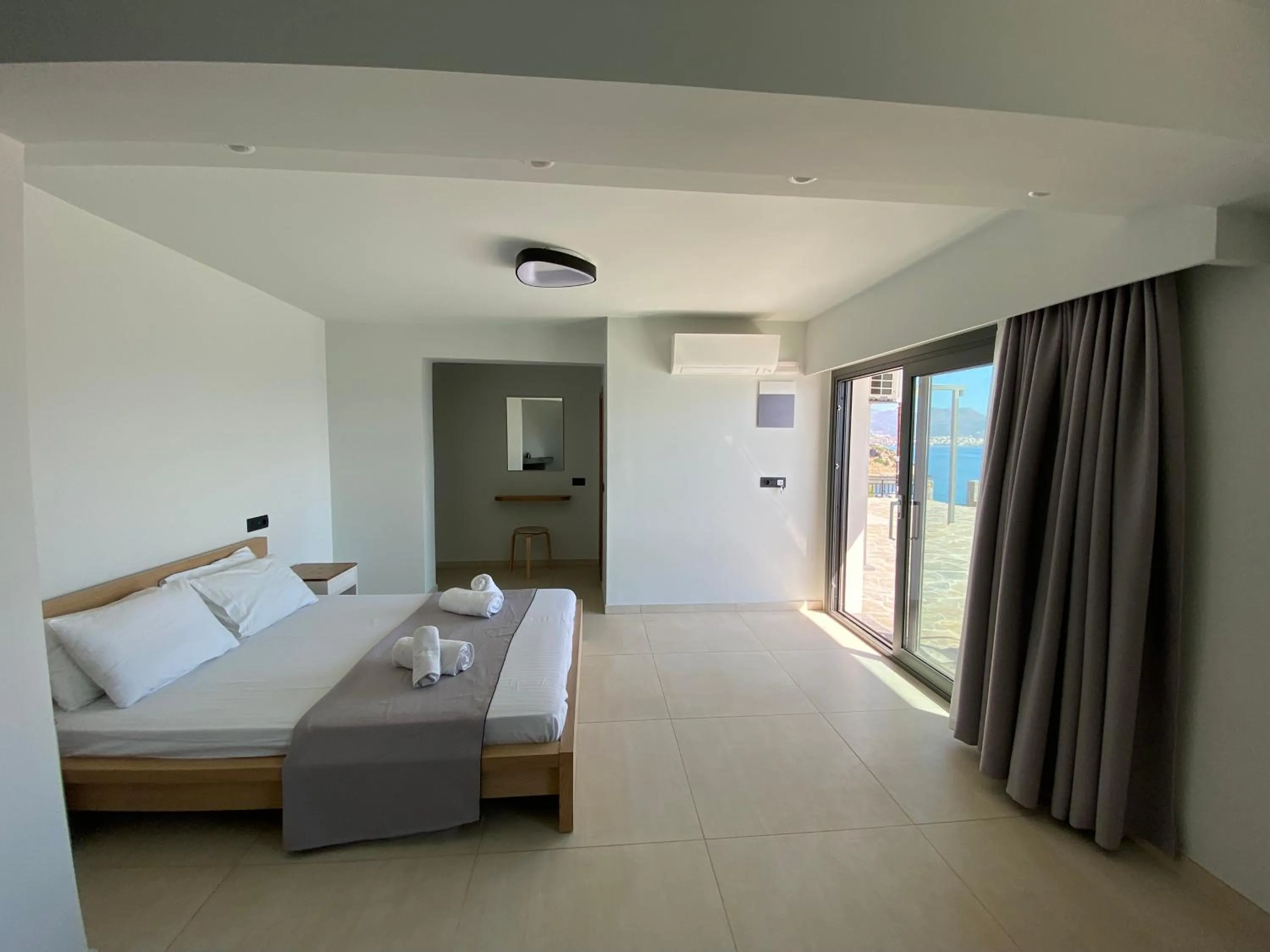 Bed in Ostria Apartments