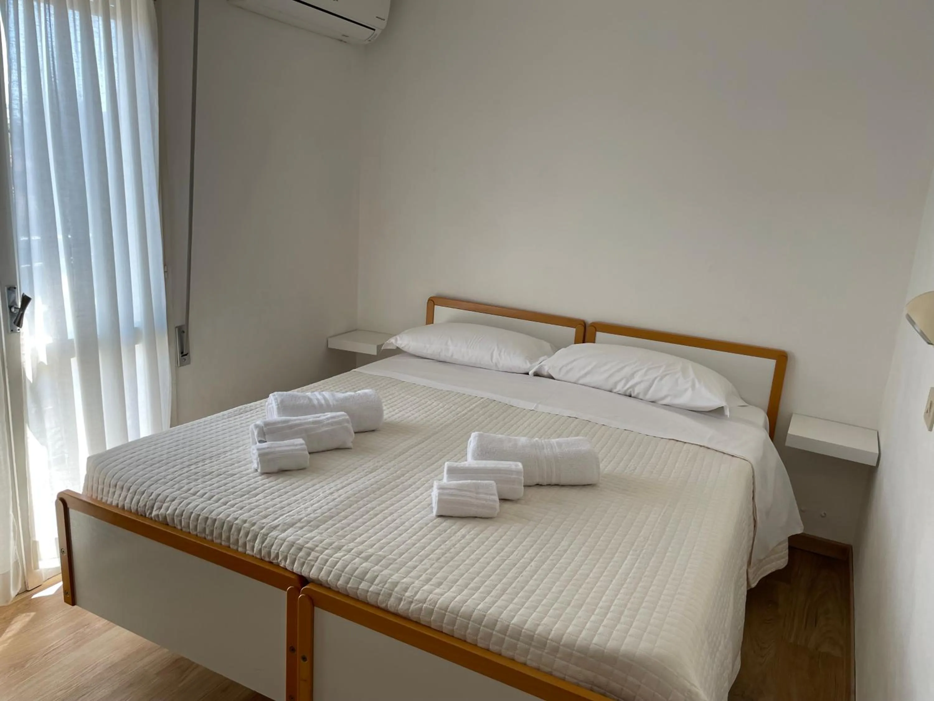 Bed in Hotel Barbiani