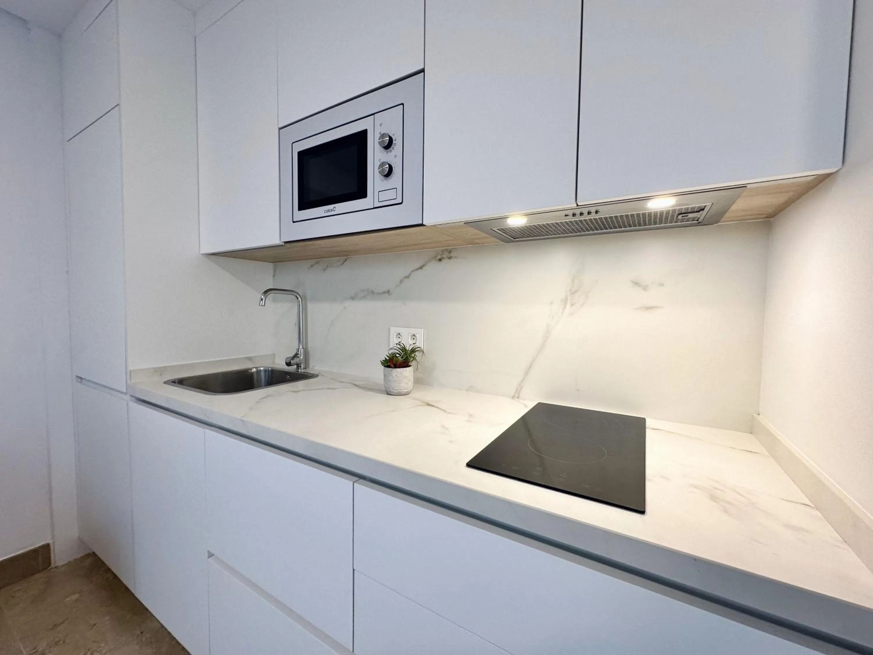 Kitchen or kitchenette in Hotel Apartamentos Marina Luz