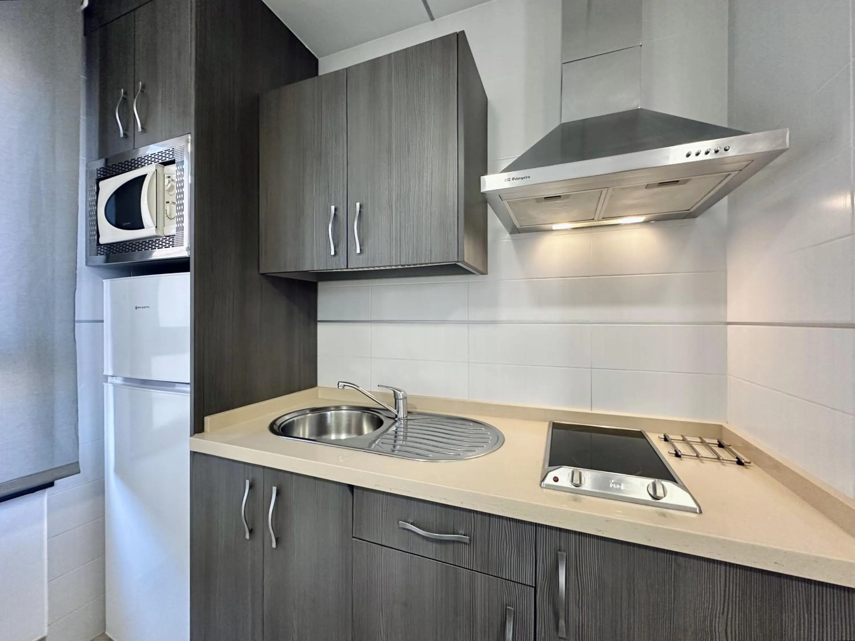 Kitchen or kitchenette in Hotel Apartamentos Marina Luz