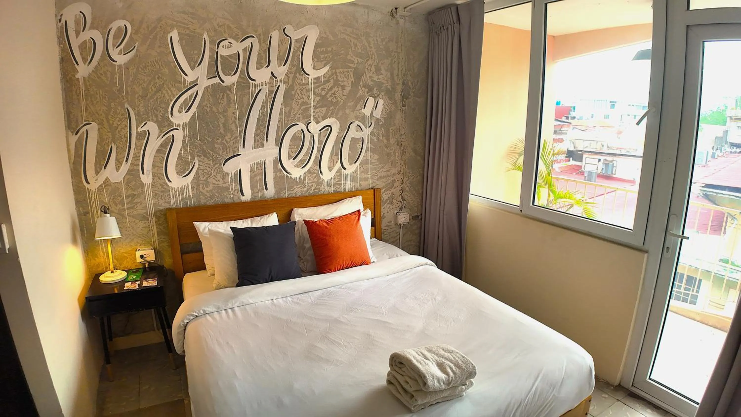 Photo of the whole room, Bed in Selina Casco Viejo Panama City