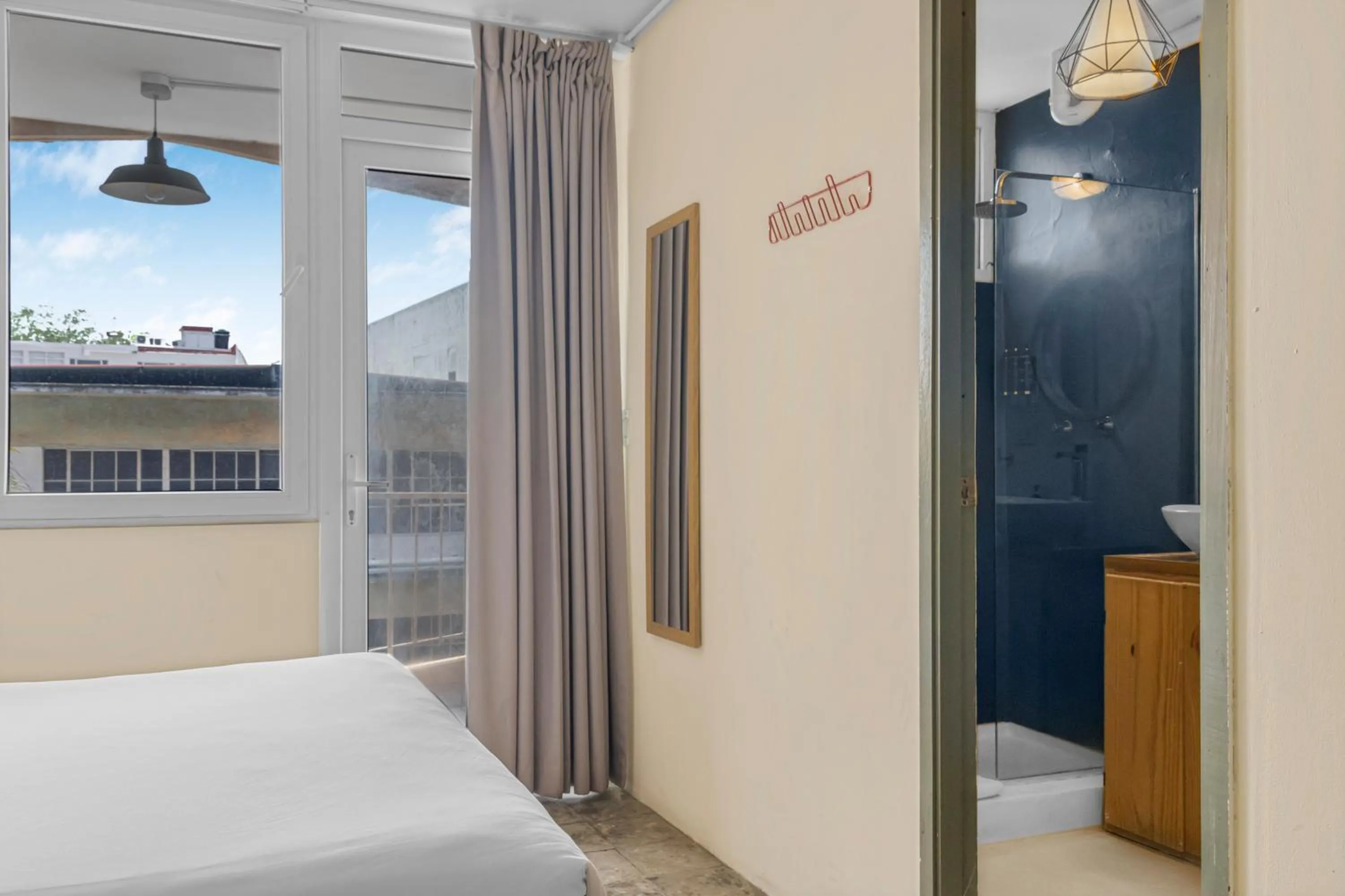 Photo of the whole room, Bed in Selina Casco Viejo Panama City