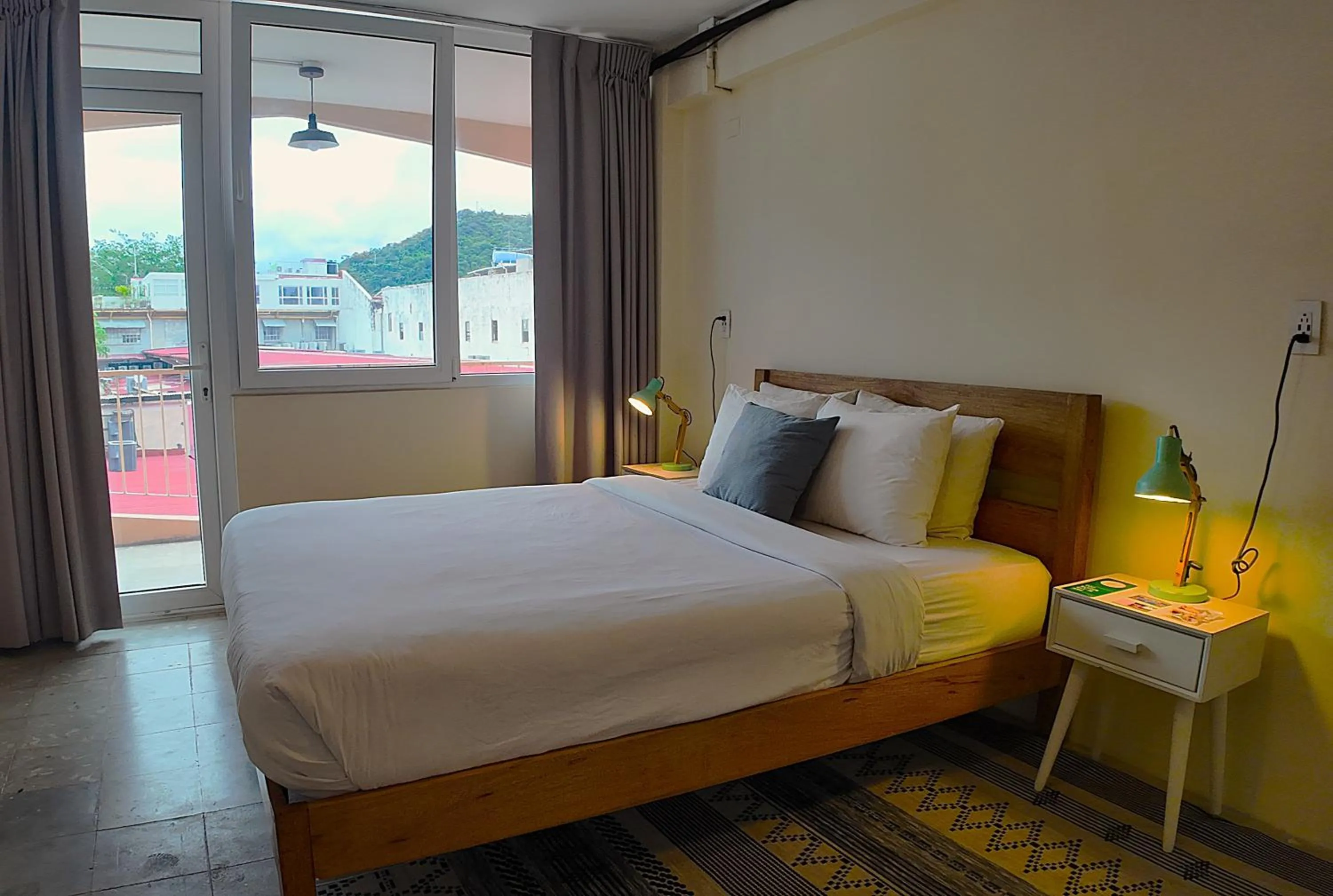 Photo of the whole room, Bed in Selina Casco Viejo Panama City