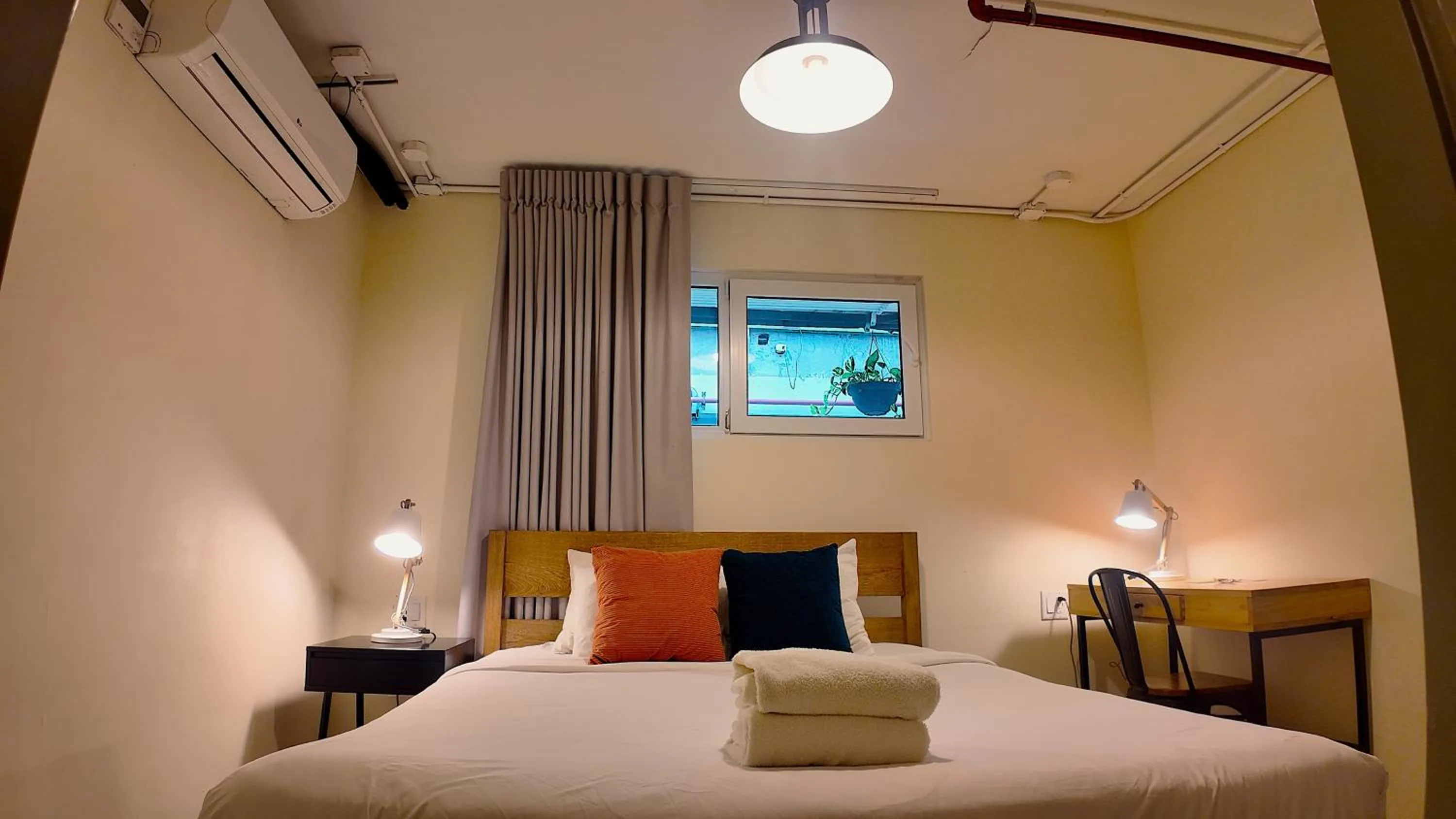 Photo of the whole room, Bed in Selina Casco Viejo Panama City