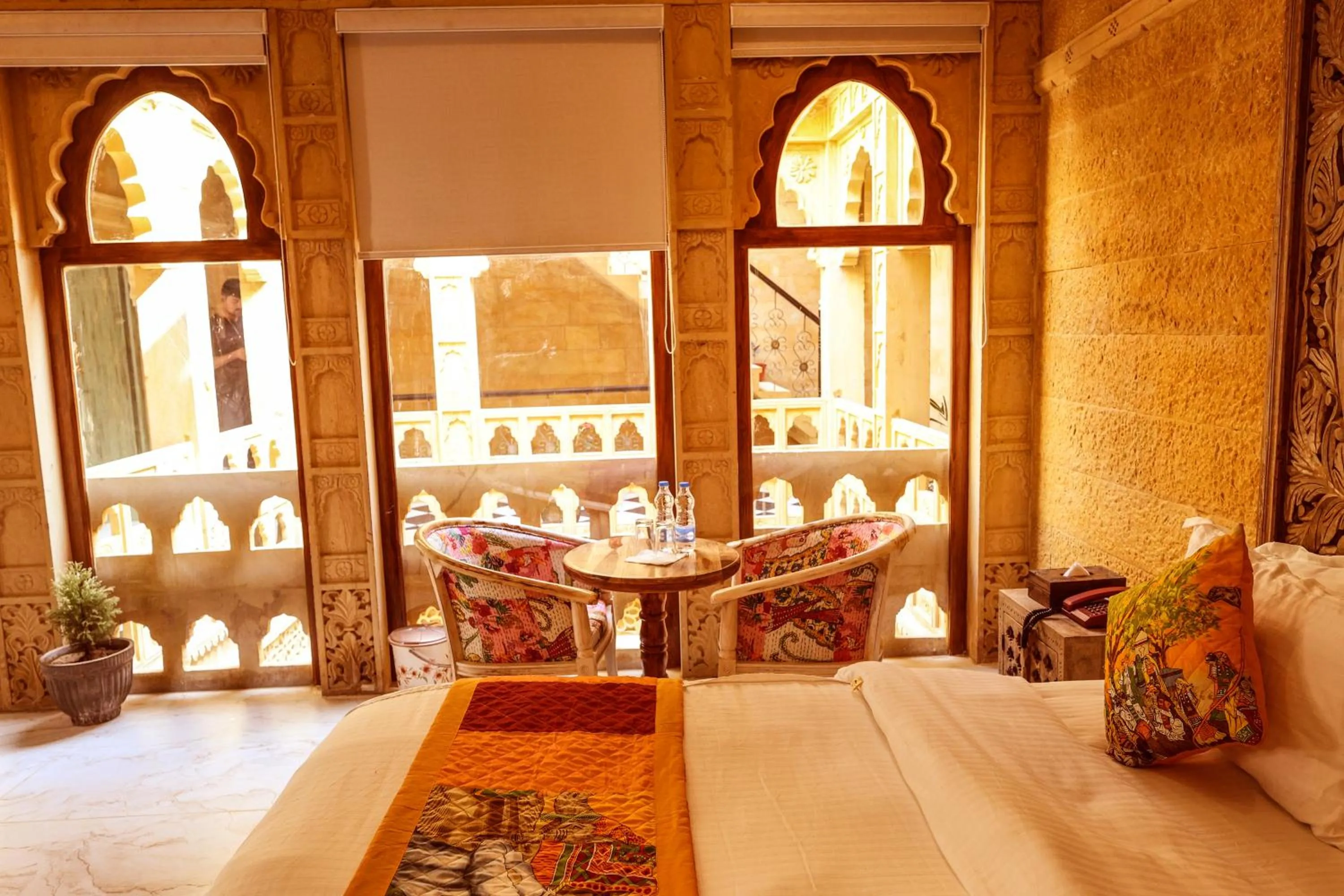 Seating area, Bed in Garh Meera - A Sensational Boutique Hotel