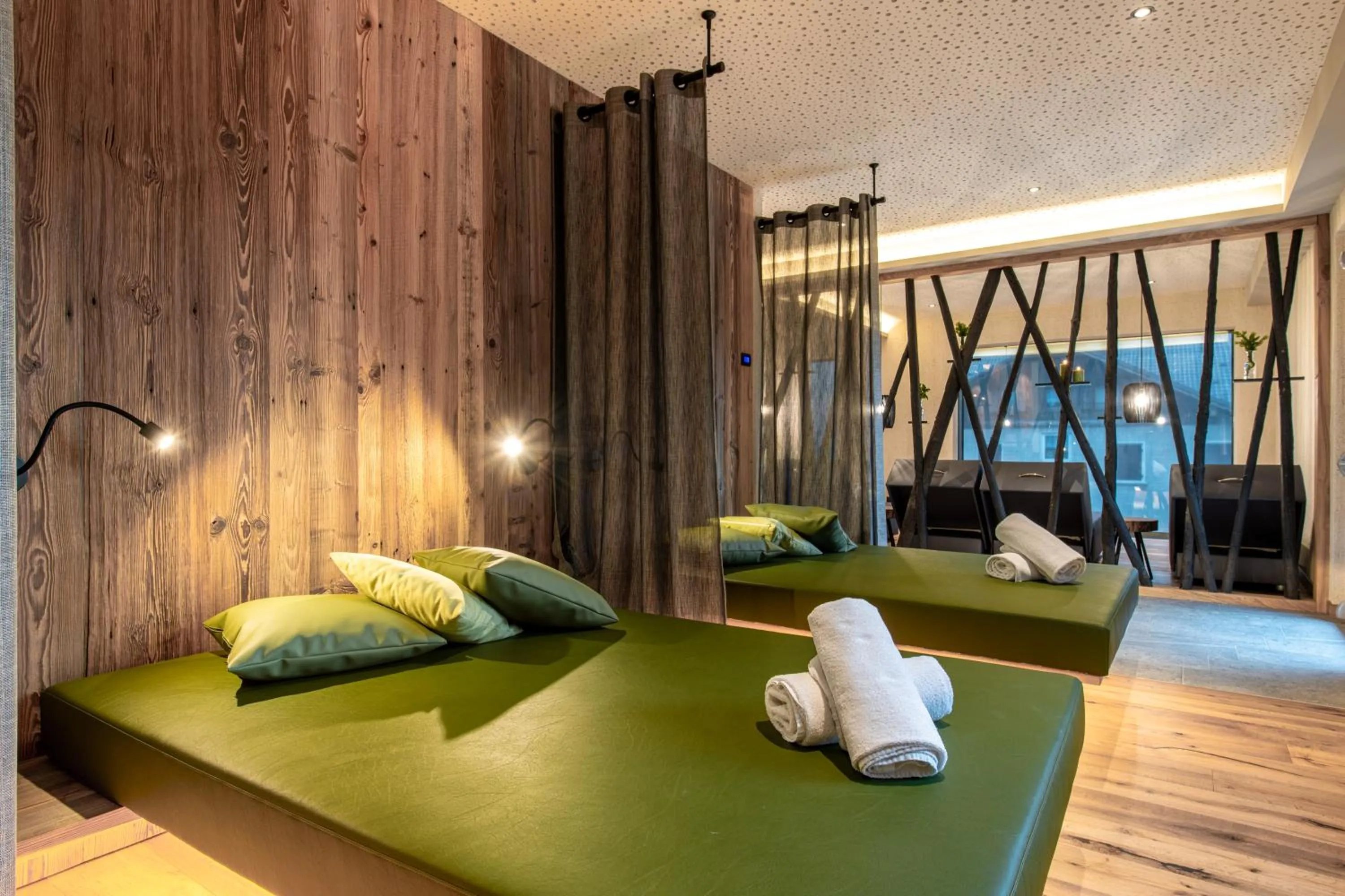 Bed in Alpotel Dolomiten