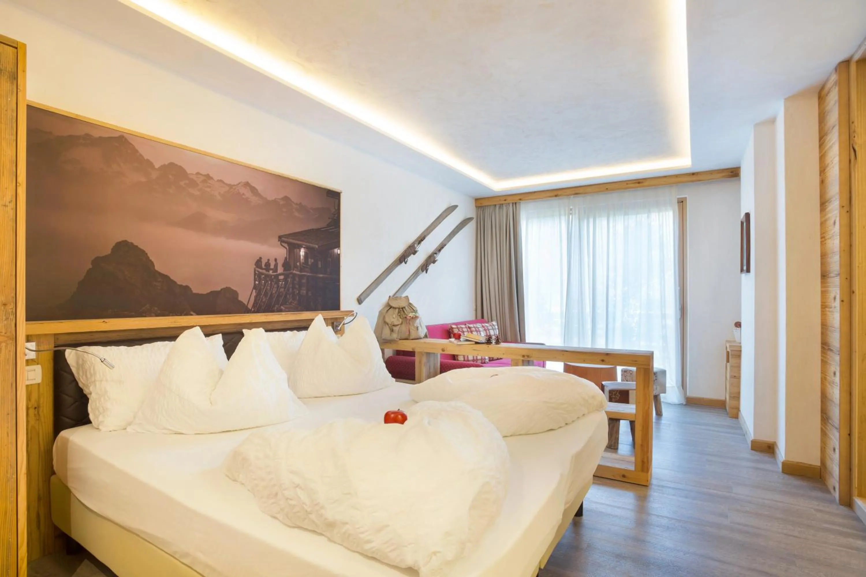 Bed in Alpotel Dolomiten