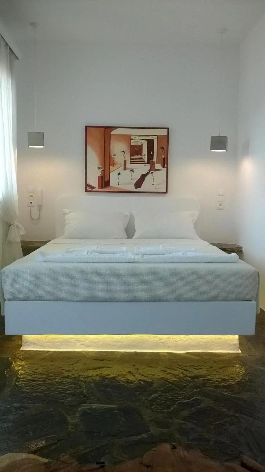 Bed in Scorpios Hotel & Suites