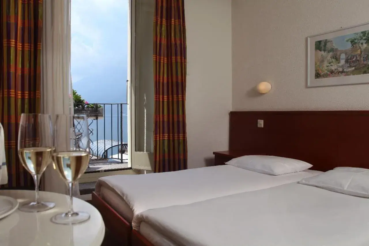 Twin Room with Balcony and Lake View - single occupancy in Piazza Ascona Hotel & Restaurants Twin Room with Balcony and Lake View - single occupancy in Piazza Ascona Hotel & Restaurants