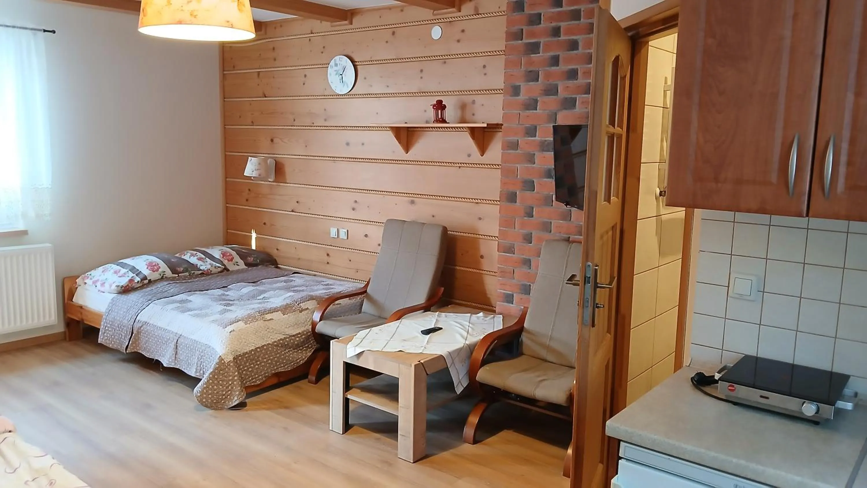 Kitchen or kitchenette, Bed in Willa Wisełka