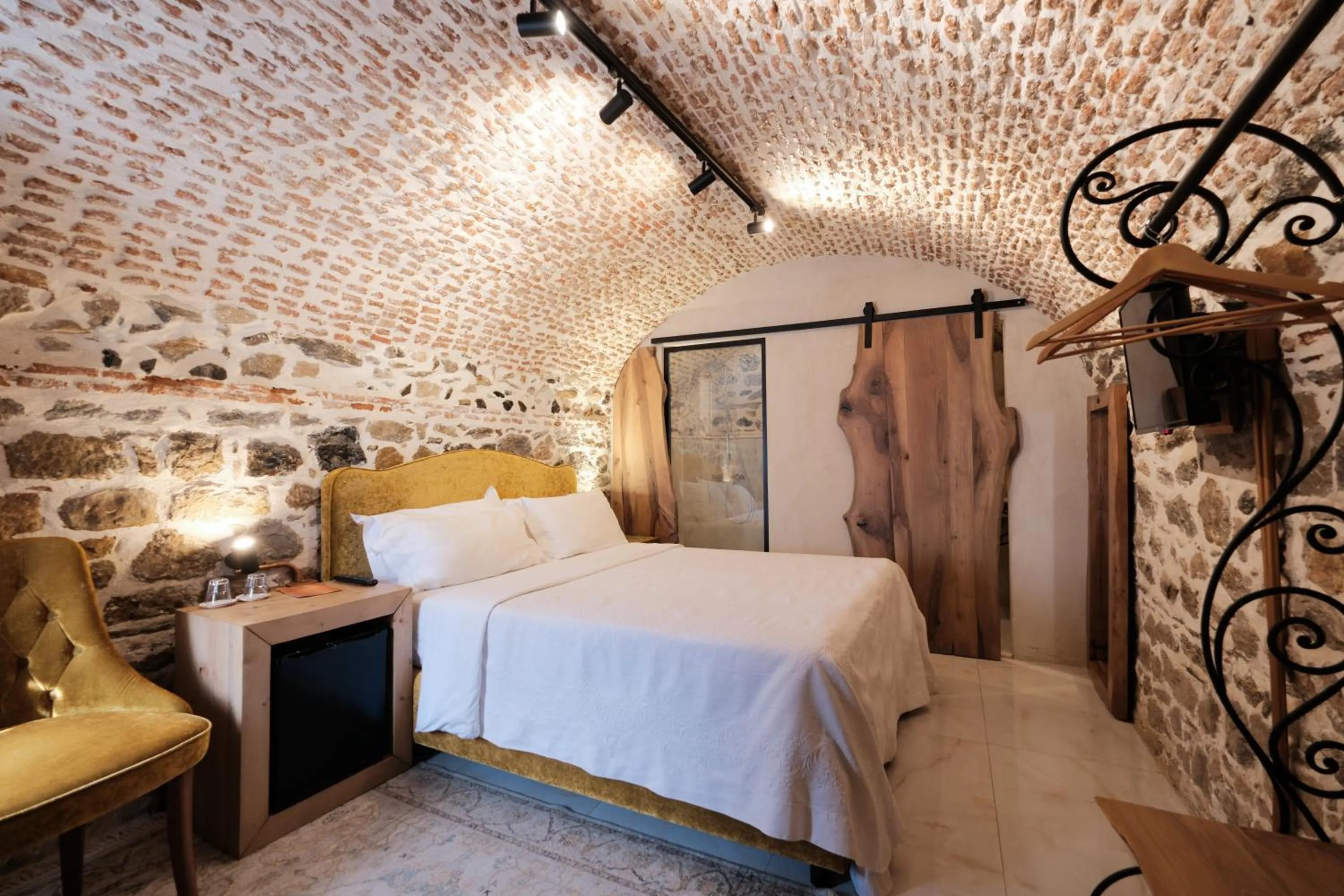 Bed in HANI I PAZARIT Boutique Hotel