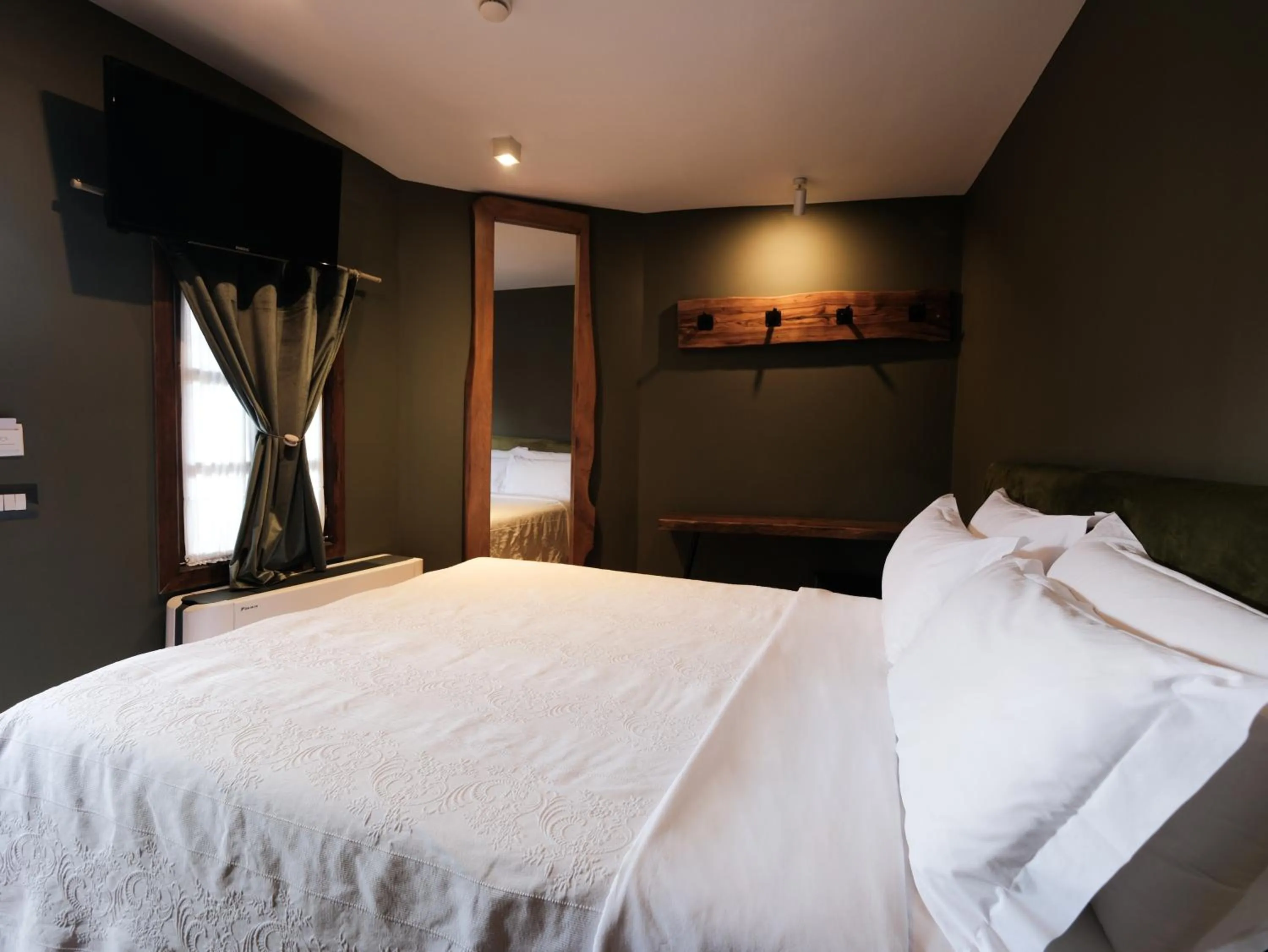 Bed in HANI I PAZARIT Boutique Hotel