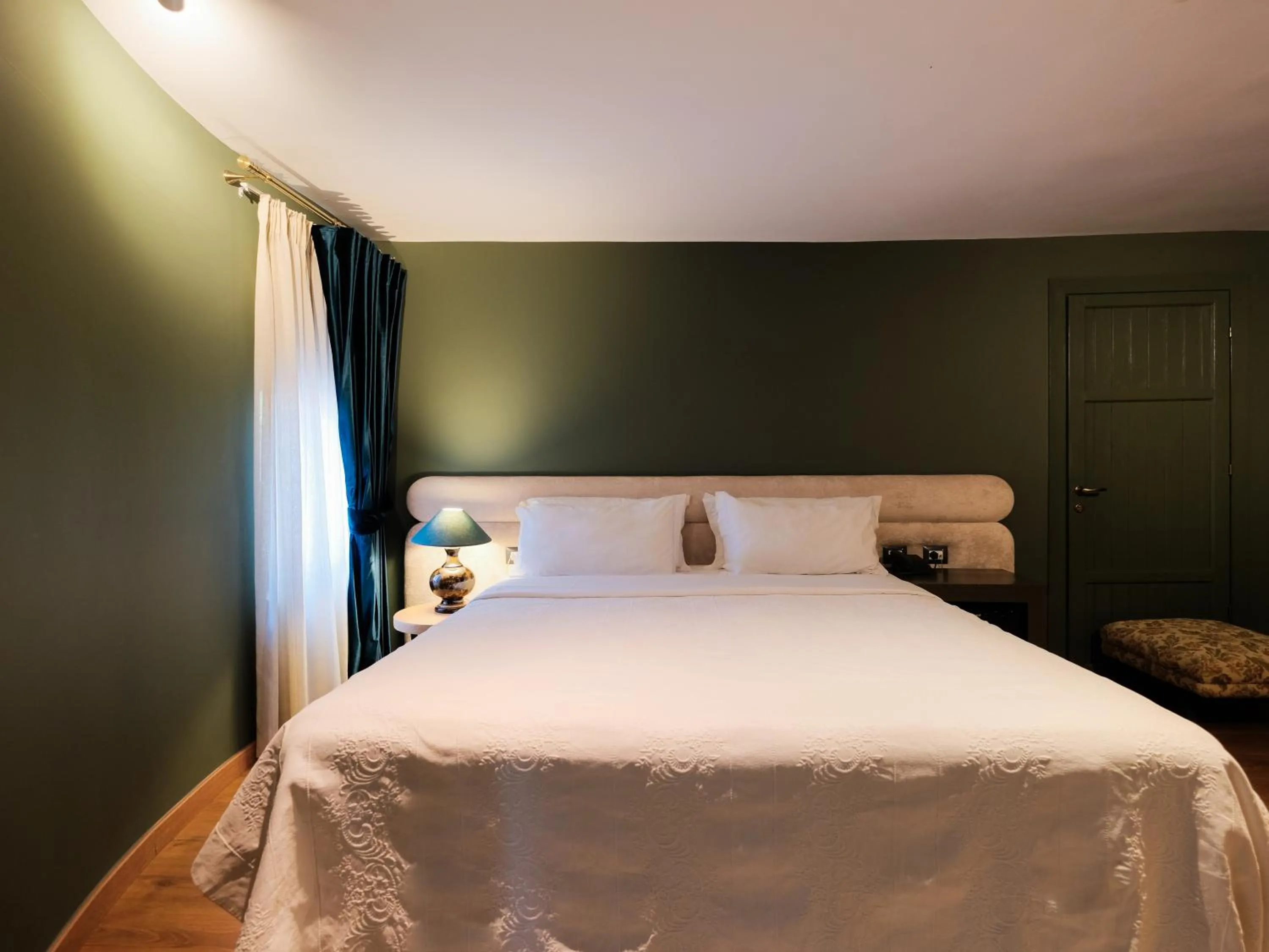Bed in HANI I PAZARIT Boutique Hotel