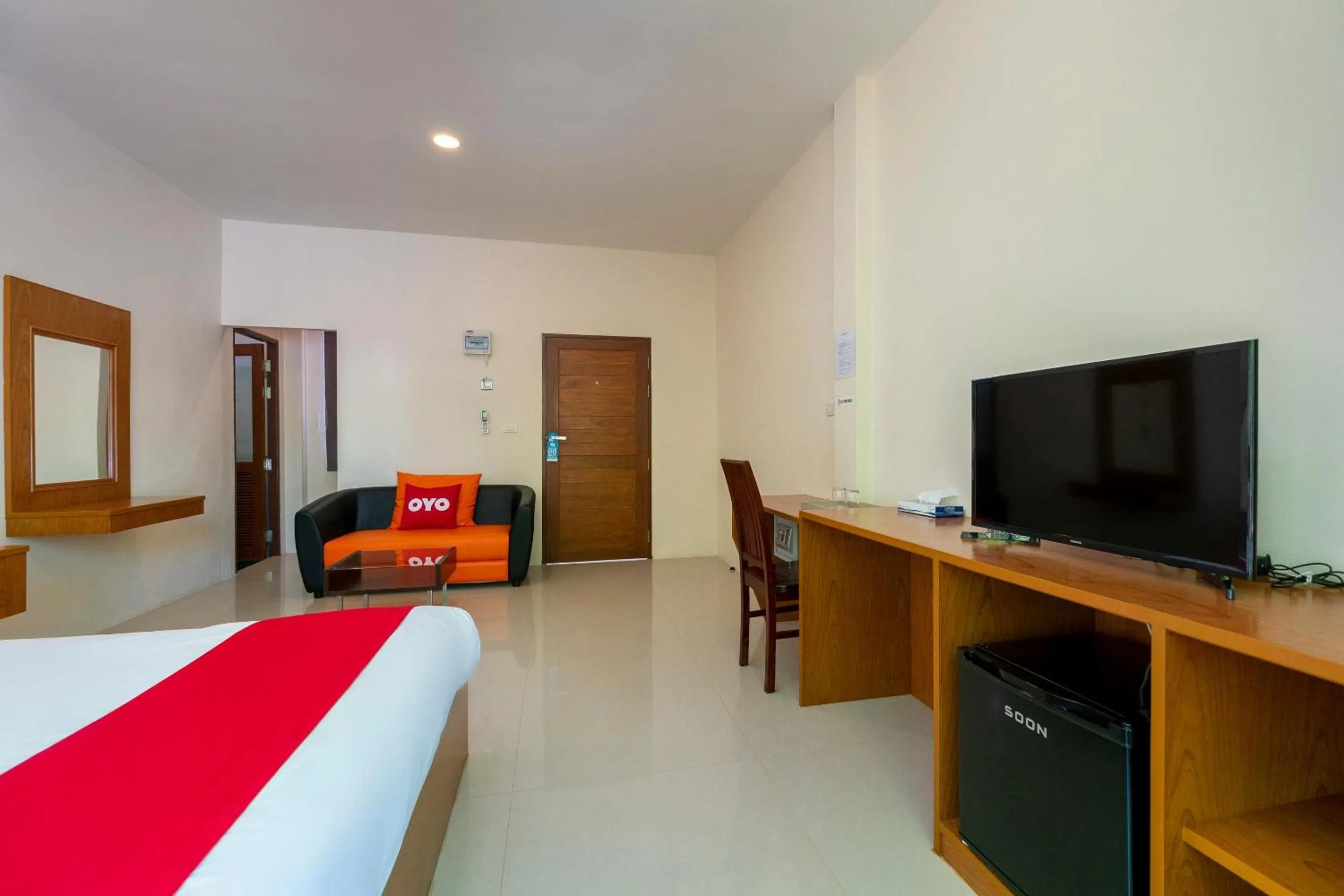 Bedroom in OYO 665 Sj House Hotel