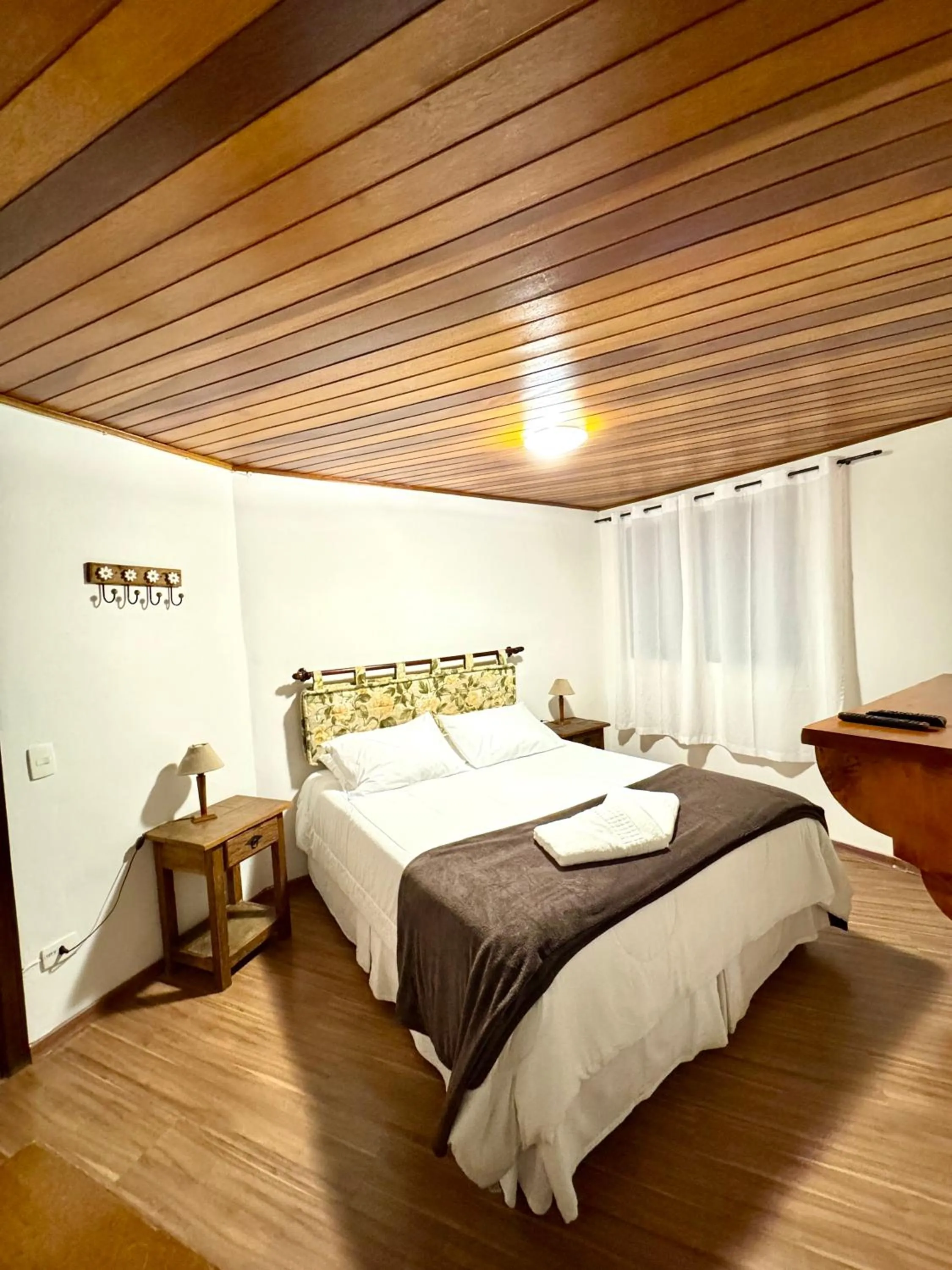 Bed in Pousada do Sino - 2 min do Capivari