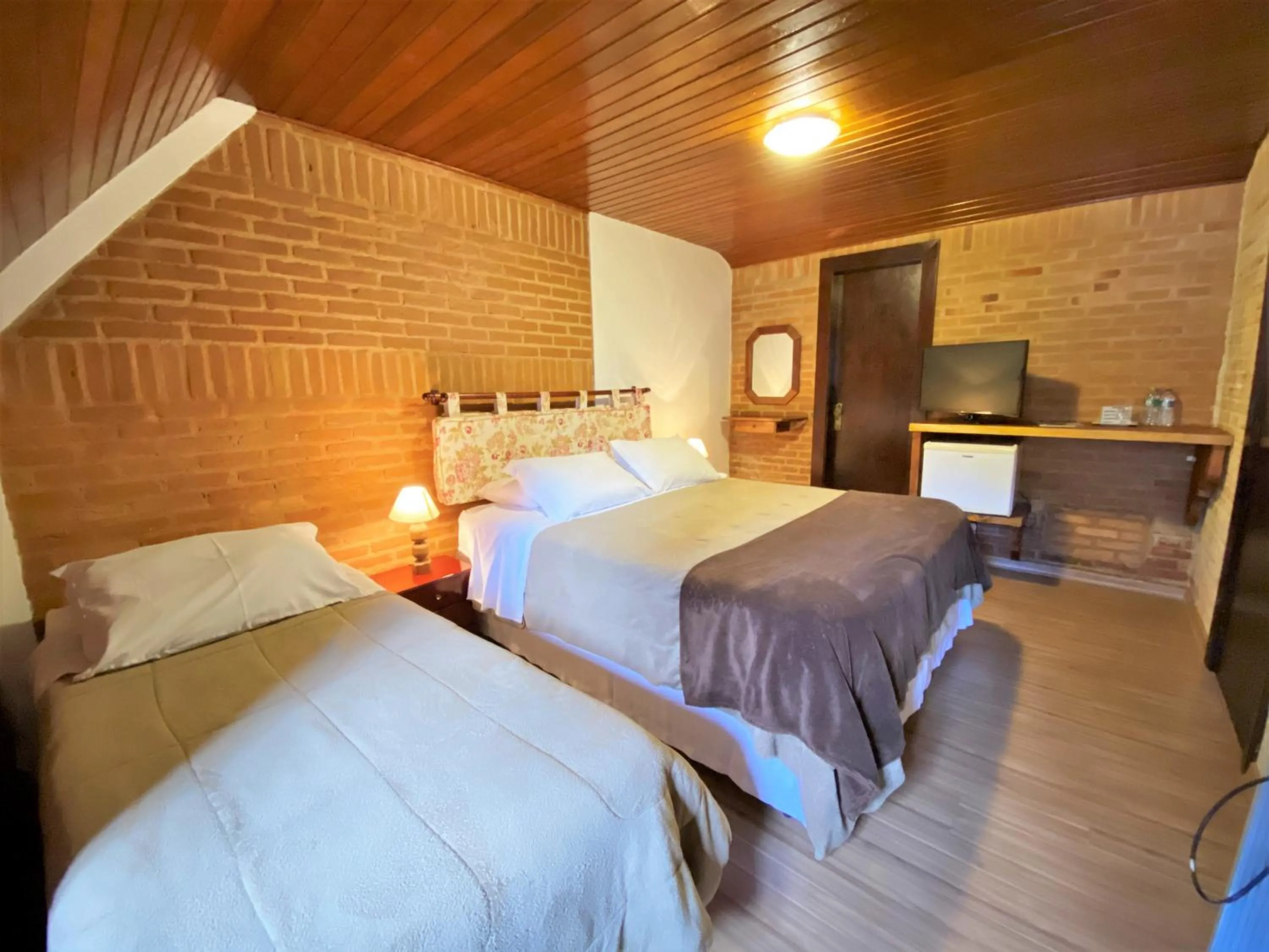 Bed in Pousada do Sino - 2 min do Capivari