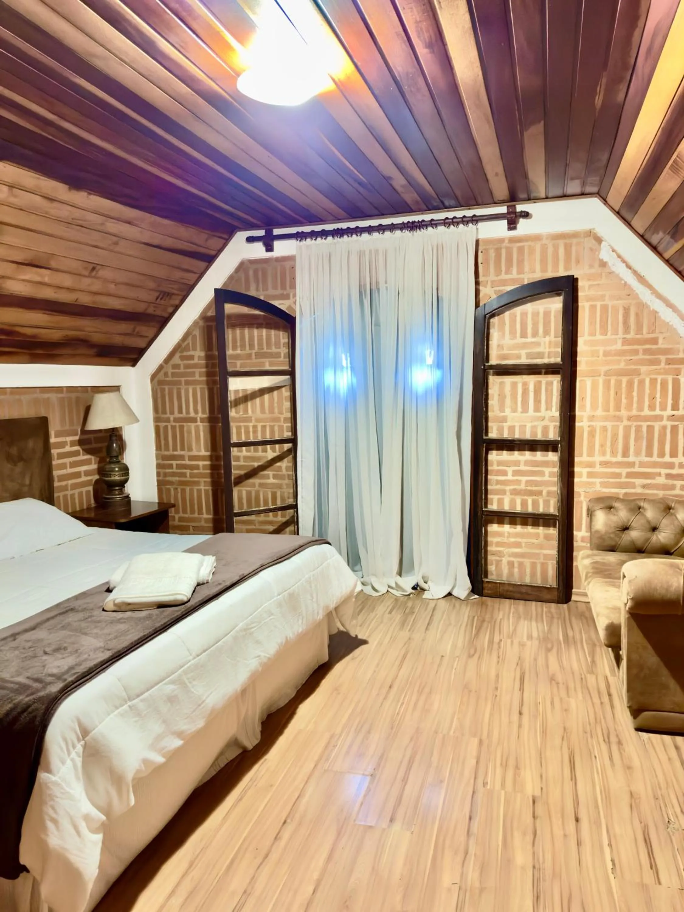 Bed in Pousada do Sino - 2 min do Capivari