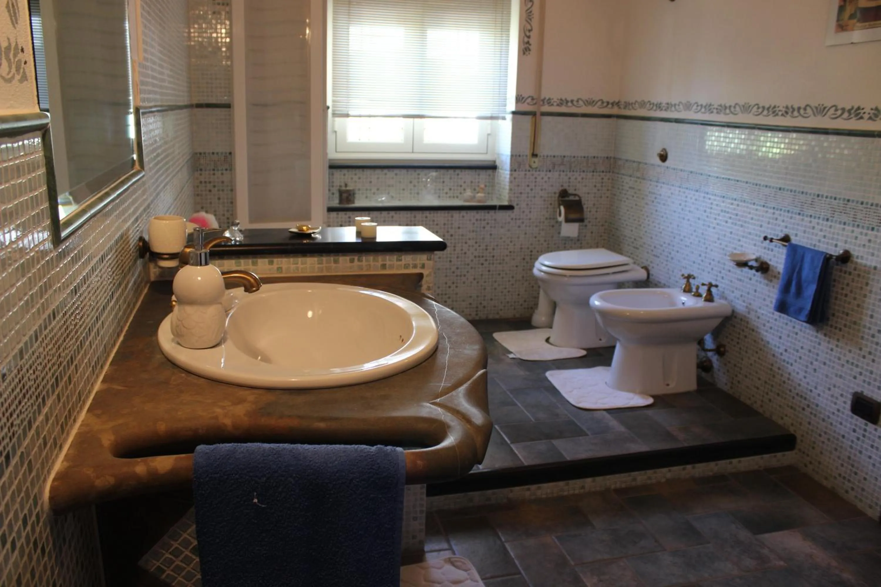 Bathroom in B&B S'arenada