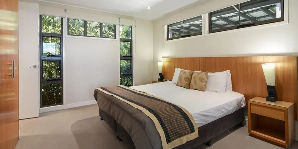 Bed in O'Reilly's Rainforest Retreat Bed in O'Reilly's Rainforest Retreat