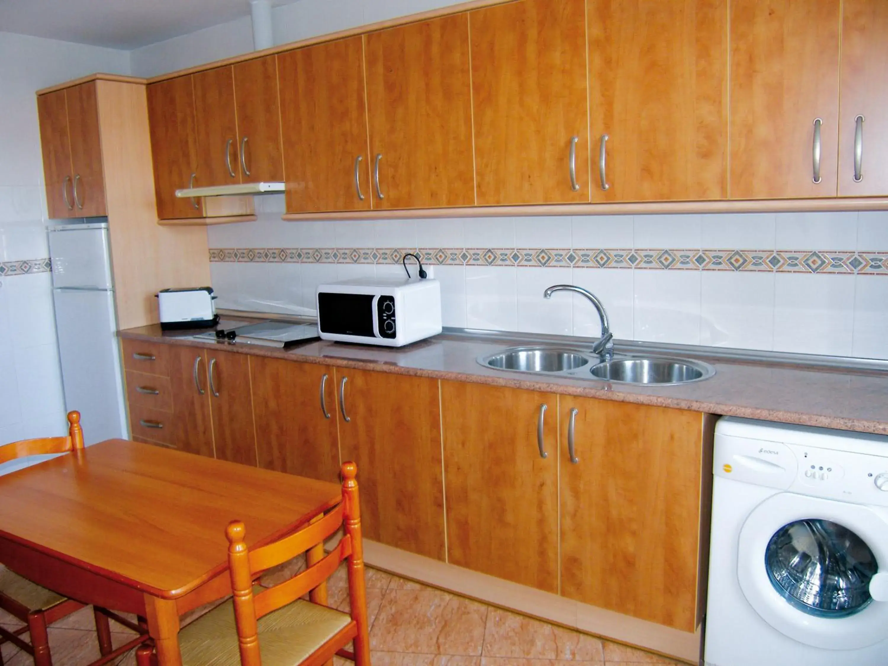 Kitchen or kitchenette in Apartamentos Maracay Kitchen or kitchenette in Apartamentos Maracay