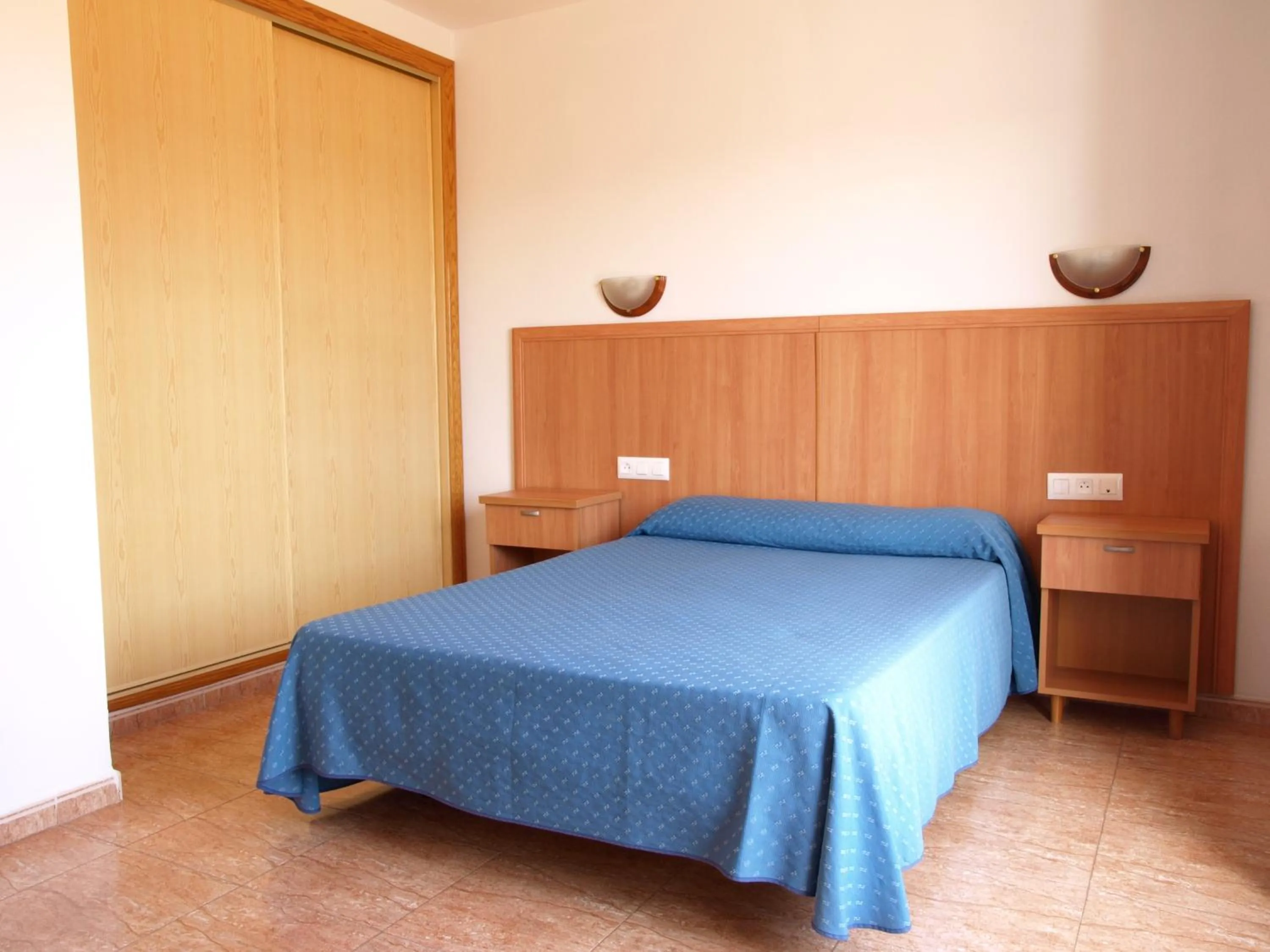 Bedroom, Bed in Apartamentos Maracay